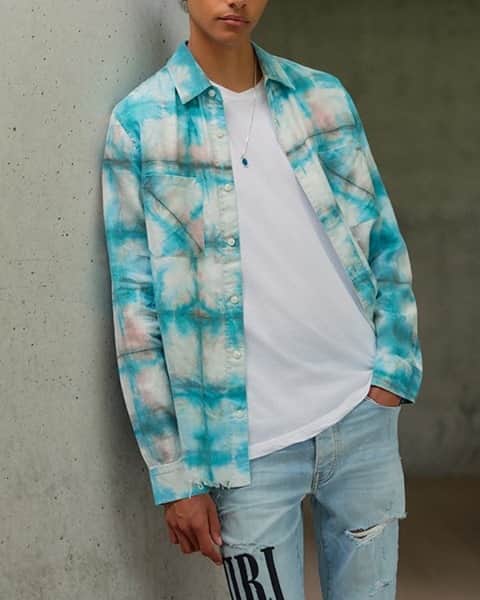 のインスタグラム：「@AMIRI refreshes the checked shirt with a DIY-inspired upgrade - this one's been bleached and tie-dyed to mirror the appearance of classic plaid. It's cut from cotton-flannel and has a distressed hem to give it a really worn-in feel. Discover via the link in bio.」