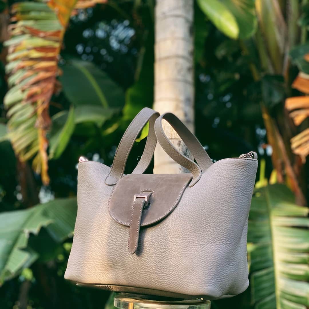 のインスタグラム：「Jungle Setting • our NEW THELA ⠀⠀⠀⠀⠀⠀⠀⠀⠀ Meet the new collection 🌴🌴🌴🌴🌴🌴 ⠀⠀⠀⠀⠀⠀⠀⠀⠀ ⠀⠀⠀⠀⠀⠀⠀⠀⠀ #h ⠀⠀⠀⠀⠀⠀⠀⠀⠀ #jungle ⠀⠀⠀⠀⠀⠀⠀⠀⠀ #melimelobags ⠀⠀⠀⠀⠀⠀⠀⠀⠀ #taupe⠀⠀⠀⠀⠀⠀⠀⠀⠀ #thelabag」