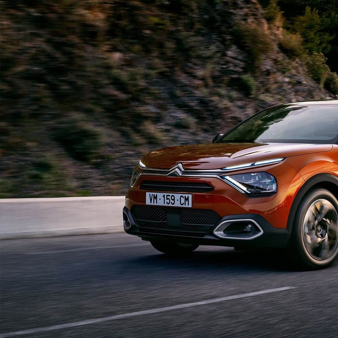 Citroënのインスタグラム：「Open the way!  With New Citroën C4 and its Citroën Suspension with Progressive Hydraulic Cushions®, turn every journey into a unique experience imbued with style and comfort. And you, what will your next destination be? Also available in 100% ëlectric. #New #Citroen #Car #Orange #Comfort #Elegance #Design #Fashion #Light #Style #Instacar #Carsofinstagram #Auto」