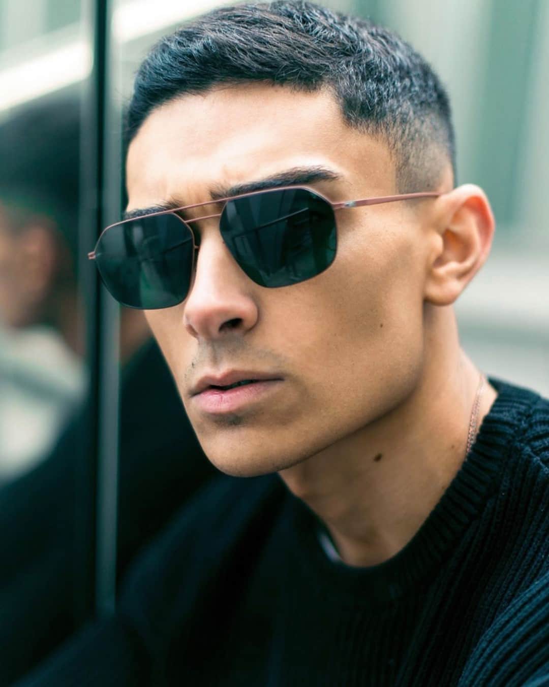 のインスタグラム：「The ESSENTIAL – experimental shapes in a reduced material concept; @crisbelinho wears MMESSE026 in Matte Brown with Dark Green Solid lenses. __ #mykita #mykitamaisonmargiela #maisonmargiela」
