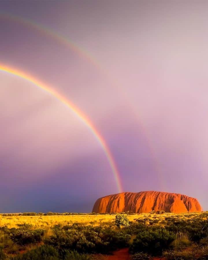 Australiaさんのインスタグラム写真 - (AustraliaInstagram)「Now this is bucket list material at its finest 🌈👌 @trys_eddy_photos was in the right place at the right time to capture this incredibly rare moment at one of Australia’s most iconic landmarks, @exploreuluru in @visitcentralaus. While the scenery of the @ntaustralia’s #RedCentre is beautiful, the local Indigenous tribes are even more inspiring. Join a @seitoutbackaustralia Cave Hill tour led by Anangu elders to learn about the Aboriginal significance of #Uluru, tour the magnificent cave paintings, and take in 360-degree panoramic views of Uluru-Kata Tjuta National Park from the top of Cave Hill. #seeaustralia #NTaustralia #RedCentreNT」9月5日 5時00分 - australia