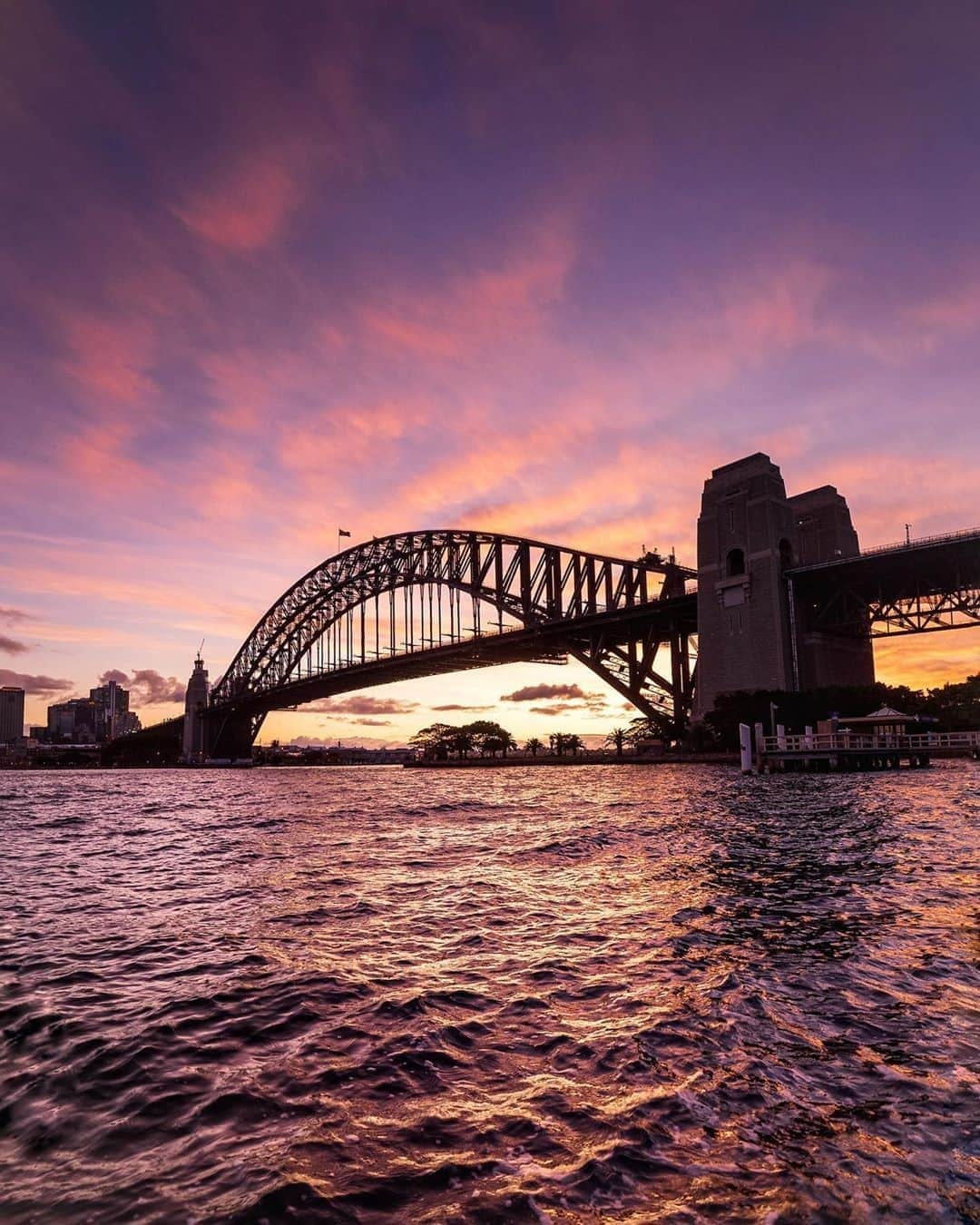 Australiaさんのインスタグラム写真 - (AustraliaInstagram)「Oh @sydney, we could stare at you all day long 💗 Captured beautifully by @elisaeves, we couldn’t help but share this stunning shot of @visitnsw’s #SydneyHarbourBridge at sunset. Taken from the harbour-side suburb of #Kirribilli, it might be hard to believe that the view does actually get better than this, but only from above! Just in time for #FathersDay in Australia, @bridgeclimb have launched their new Ultimate Climb, meaning you can now enjoy panoramic harbour views from one side of the bridge to the other… and back again! Know someone that would be up for the Ultimate Climb challenge? Tag them below! #seeaustralia #visitnsw #bridgeclimb #sunset #ilovesydney」9月6日 5時00分 - australia