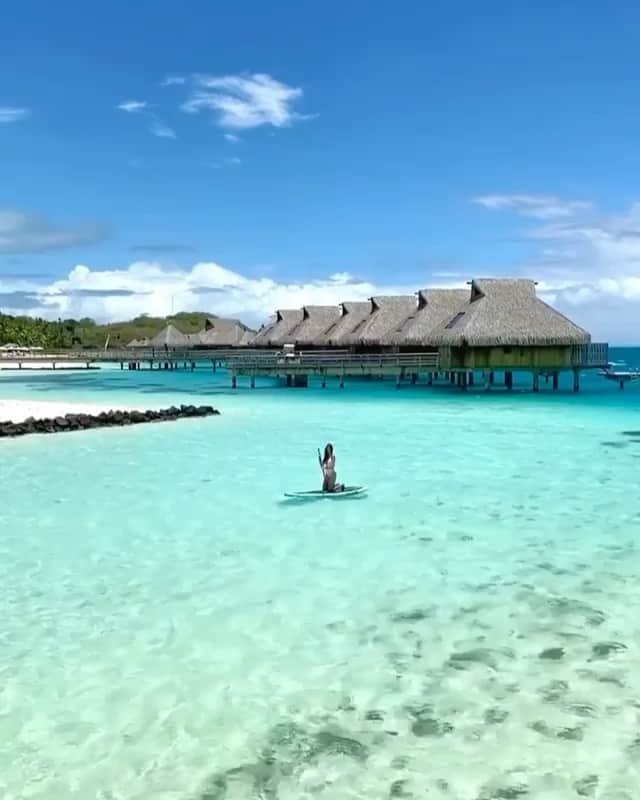 BeStylishのインスタグラム：「Floating in the bluest lagoon in Bora Bora 🐠 • Where on this planet would you love to be right now if travel restrictions weren’t an issue? 🗺 • • #borabora #frenchpolynesia #lagoon #paradise #islandlife #beachesnresorts #beautifulhotels #resorts #hotelsandresorts #voyaged」