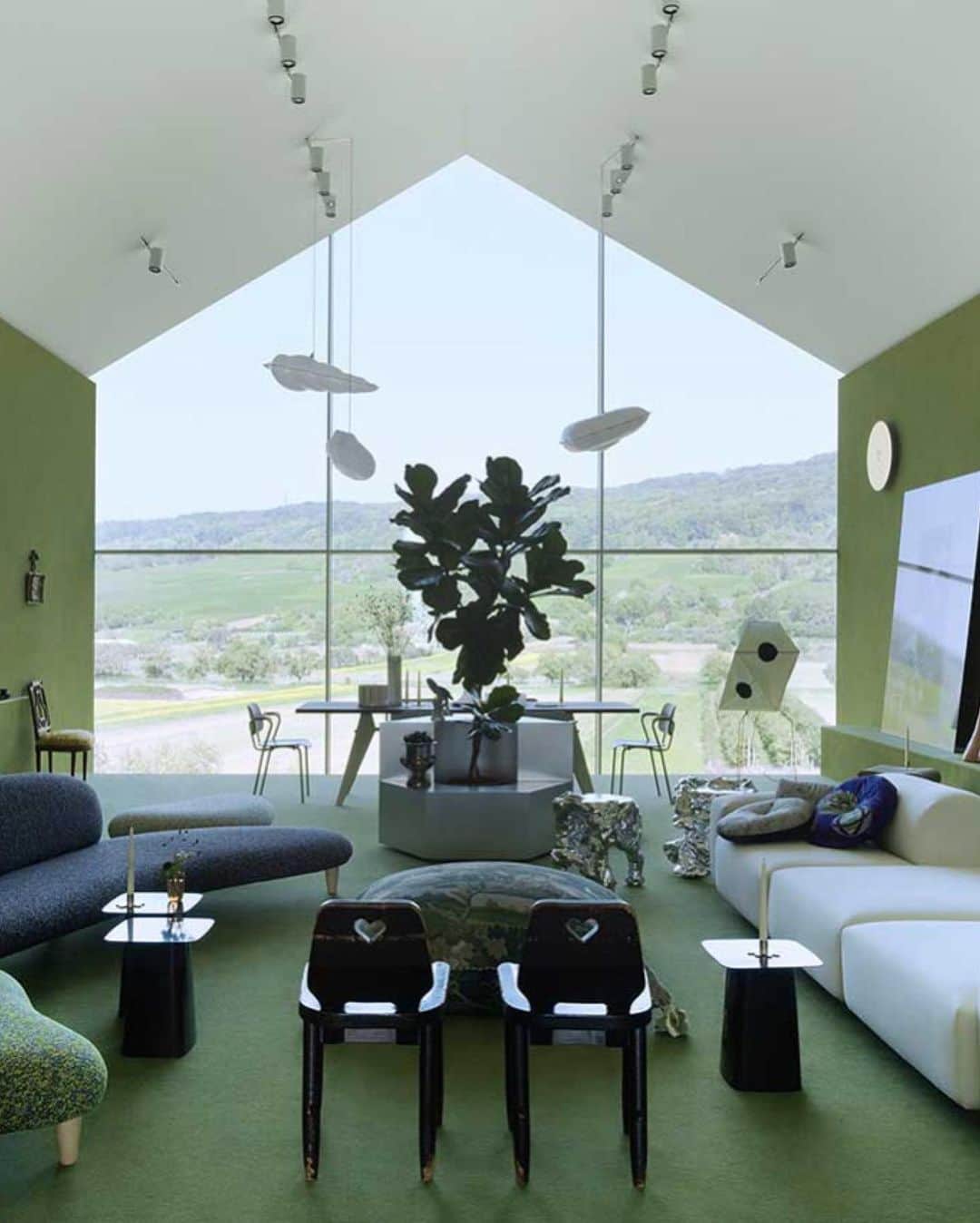 Design Milkさんのインスタグラム写真 - (Design MilkInstagram)「New York- and Los Angeles-based @ch_herrero took the reins and reimagined the @vitra VitraHaus loft in Weil am Rhein, Germany as a “lush landscape for living indoors.” The vibrant loft is grounded in shades of moss green and sky blue with a variety of designs incorporated throughout that give nod to art, films, characters, books and places that intrigue the designers. \\\ designmilk[dot]com \\\ photos by @clemenspoloczek」10月6日 9時54分 - designmilk