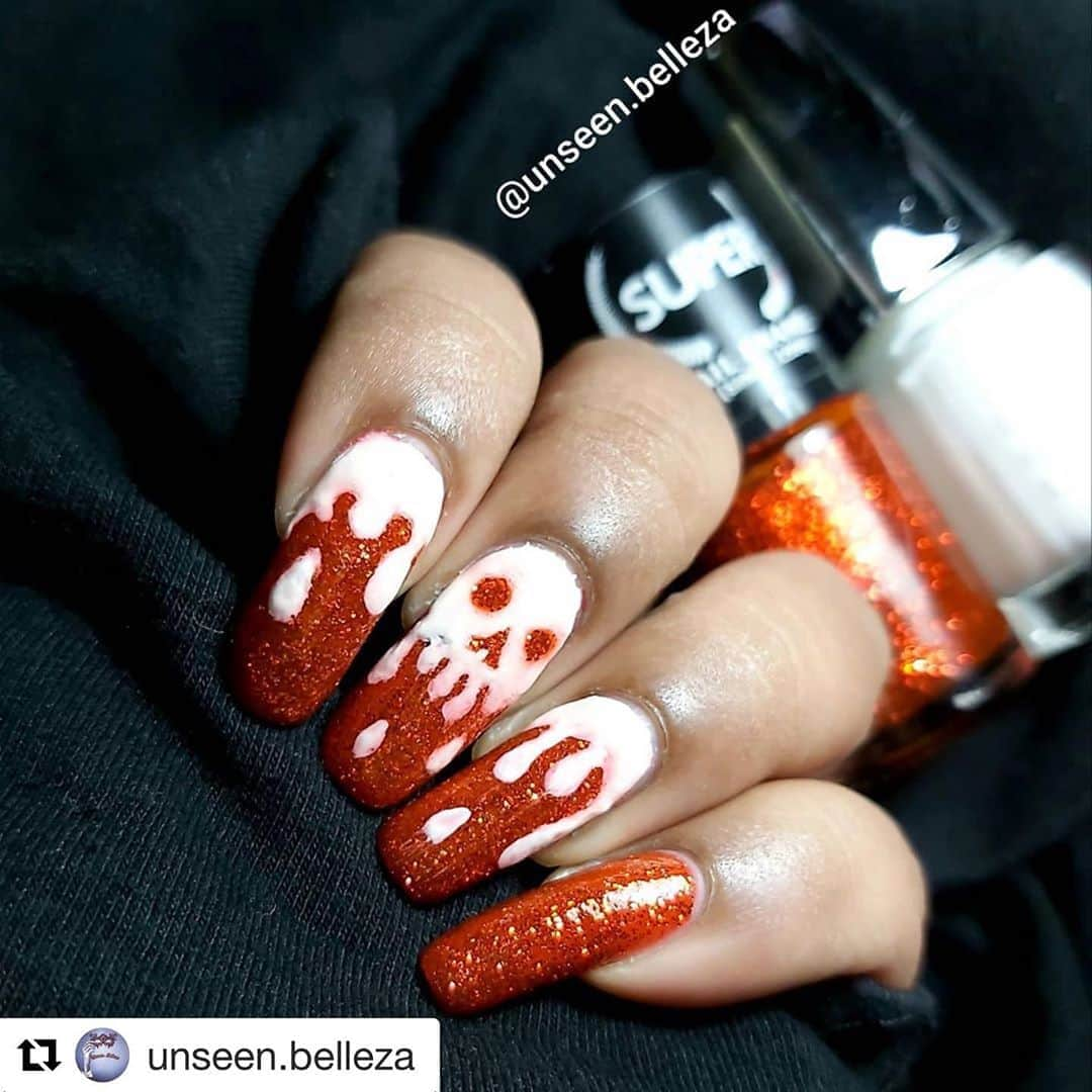 Nail Designsさんのインスタグラム写真 - (Nail DesignsInstagram)「Credit: @unseen.belleza  ・・・ Hallow guys!! 🎃👻 So I have thought of starting up few nail arts on the theme of #halloweennails . . Hope I could continue to post consistantly 🙈😅 Here I had made a nail art  inspired from @nailbees She is such an amazing artist 😍 Hope I had made justice while recreating it💕 .   Products used  Red glitter from @supernailenamels White from @lakmeindia  . . Let me know in the comments your views and any suggestions for future nail art on this theme😘🤗 . And tried to take pictures under different lighting  So there is no editing up there . #halloween #horror #spooky  #cosplay #horrormovies #october  #halloweencostume #halloweenmakeup #scary #michaelmyers #pumpkin #trickortreat #fall #happyhalloween #creepy #goth #halloweendecor #witch  #autumn #horrorfan #skeletonart #gothic #skeleton #halloweeneveryday」10月6日 3時15分 - nailartfeature