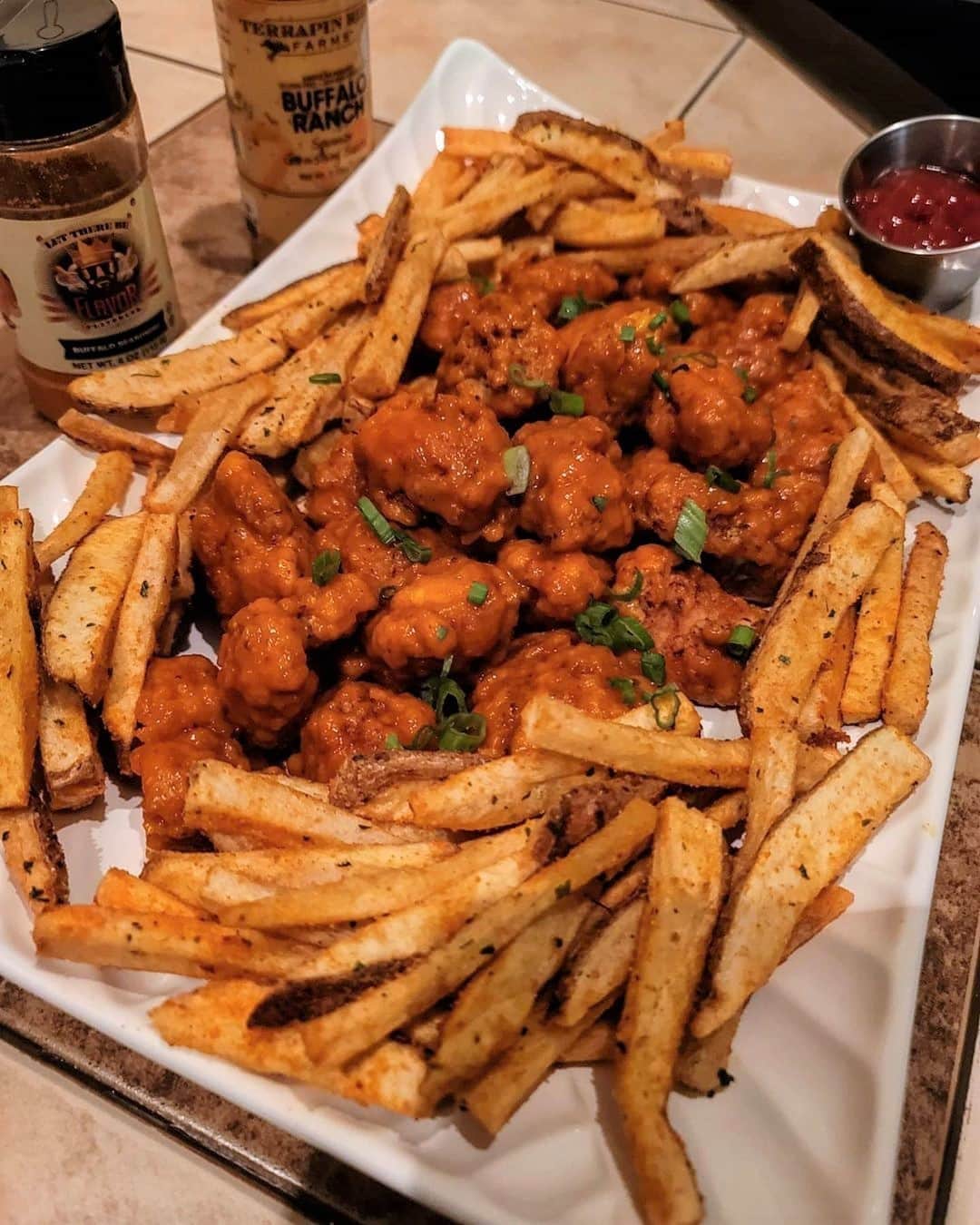 Flavorgod Seasoningsさんのインスタグラム写真 - (Flavorgod SeasoningsInstagram)「Customer @roarbertoe with some Boneless Wings & Flavor God Buffalo Seasoned Fries on a Beautiful Monday night. 🍟 🔥🔥🔥 Everything is homemade besides the suace! 😋 👌 😍⁠ .⁠ DO YOU LIKE PREFER BONELESS WINGS OR BONE IN?!? 🙌🤯⁠ .⁠ Add delicious flavors to your meals!⬇️⁠ Click link in the bio -> @flavorgod  www.flavorgod.com⁠ -⁠ Flavor God Seasonings are:⁠ ➡ZERO CALORIES PER SERVING⁠ ➡MADE FRESH⁠ ➡MADE LOCALLY IN US⁠ ➡FREE GIFTS AT CHECKOUT⁠ ➡GLUTEN FREE⁠ ➡#PALEO & #KETO FRIENDLY⁠ -⁠ #food #foodie #flavorgod #seasonings #glutenfree #mealprep #seasonings #breakfast #lunch #dinner #yummy #delicious #foodporn」10月6日 8時01分 - flavorgod