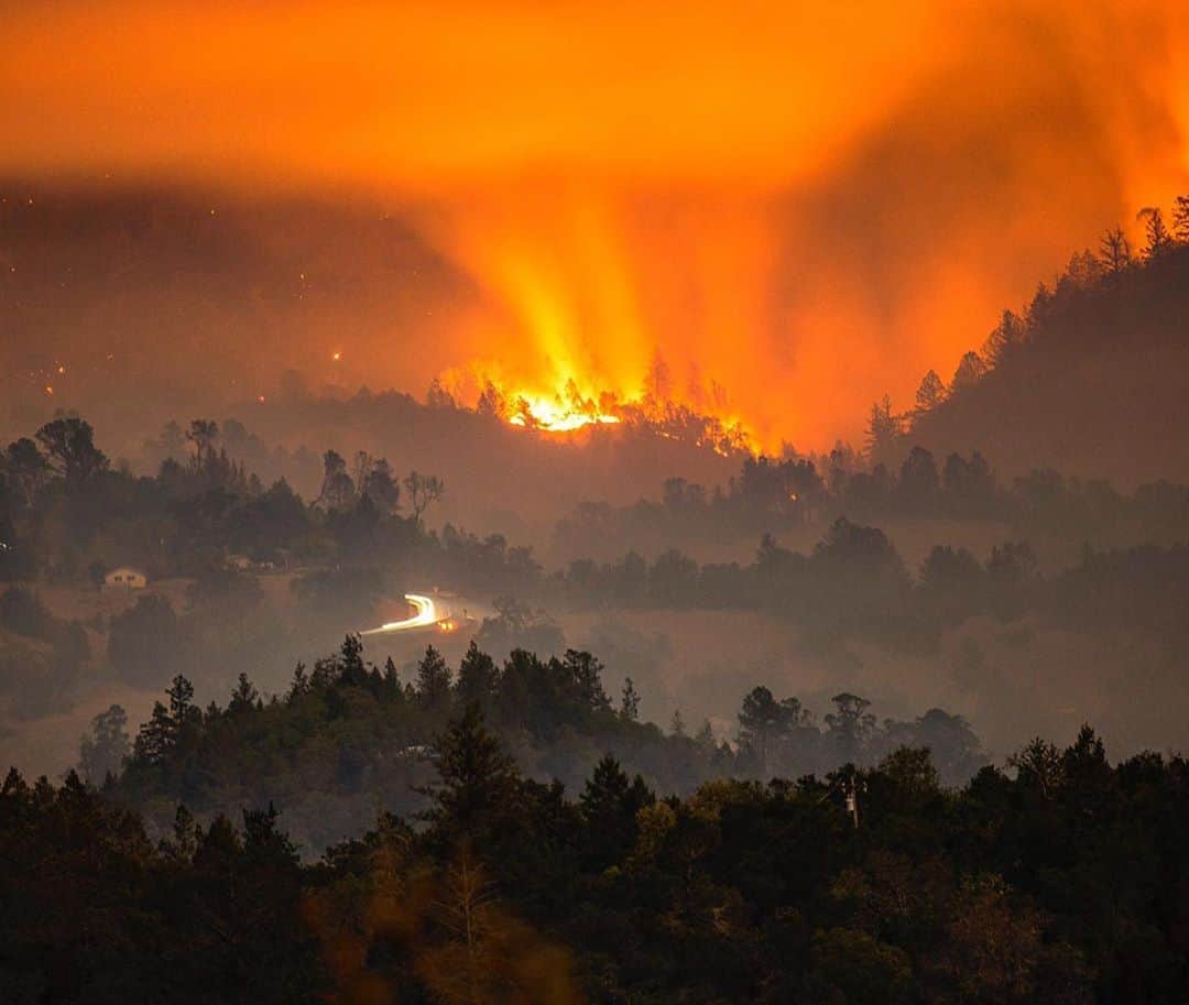 National Geographic Creativeさんのインスタグラム写真 - (National Geographic CreativeInstagram)「Photo by @stuartpalley / The Glass Fire burns northeast of Calistoga, Ca shortly after midnight. The blaze was over 51,000 acres and 2% contained. Above thermal belts, the fire burned actively much of the night and was already spotting past containment lines as of writing. The fire started during a north wind event, and another Red Flag Warning (RFW) starts in 90 minutes for a 31-hour period. I embedded last night with a strike team near Angwin cutting dozer line and protecting homes. The fire behavior was extremely active.   I’m here in Sonoma and Napa counties on assignment covering the Glass Fire impacting wine country and the wine industry itself. This hits close to home as friends yet again are being evacuated and losing structures and businesses for the 3rd time in 4 years, in some cases. The fall harvest is also being adversely affected. Driving past wineries I’ve visited as a tourist and knowing they are gone, I have trouble holding back tears. This all feels incredibly personal.   The fire also impacts the laborers who work in the fields and pick the grapes. With fire closures for safety and a new agricultural permit access system, implementation mid-fire siege is an ongoing issue.   Stay safe out there, have an evacuation plan ready, and follow local emergency alerts. Follow evacuation orders, and don’t hesitate to leave if you feel uncomfortable.」10月2日 5時59分 - natgeointhefield