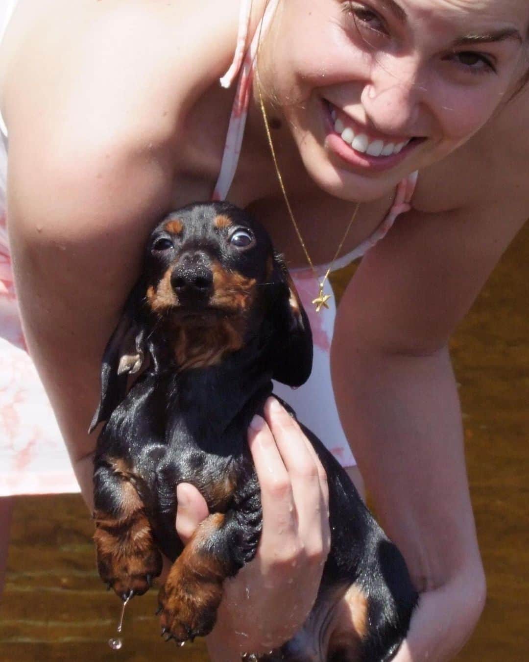 Crusoe the Celebrity Dachshundのインスタグラム：「"This picture popped up in my feed as being exactly 9 years ago today - it's baby Oakley taking his first ever swim in the lake! (He maybe found it a little chilly😝)"  ~ Crusoe」