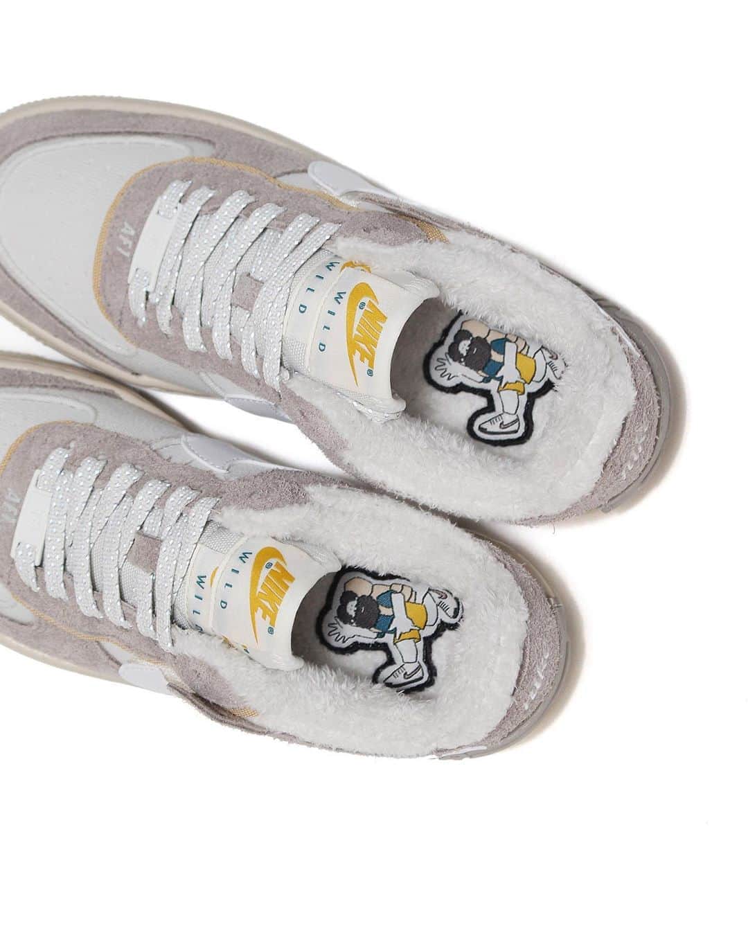 A+Sのインスタグラム：「in stock now  ■NIKE WMNS AF1 SHADOW COLOR : SAIL SIZE : 23.0cm - 25.0cm PRICE : ¥13,000 (+TAX)  都会にたたずむビル群や建築物からカラーインスピレーションを得て、冬の厳しいコンディションにおいても快適にワイルドに楽しく過ごすことをコンセプトにナイキ ワイルド コレクションとしてデビュー。カラーはコンクリートや団地の壁面に使われる様な、ベージュやライトグレーを基調とした淡いカラーでまとめ、厳しいコンディションに備えインナーにボアを用いています。シューレース、ヒールにはリフレクティブ素材を配置し、夜間でもアクティブに楽しめる様なデザインになっています。  Taking color inspiration from the buildings and buildings in the city, we made our debut as the Nike Wild Collection with the concept of being comfortable and wild even in the harsh winter conditions. The color is a light color based on beige and light gray, which is used for the walls of concrete and housing complex, and the bore is used for the inner in preparation for severe conditions. Reflective material is placed on the laces and heel, and it is designed so that you can enjoy it actively even at night.  #a_and_s #NIKE #NIKEAF1 #NIKEAF1SHADOW #NIKEAIR #NIKEAIRMAX #NIKEAIRMAX95 #NIKEBLAZERMID #NIKEFLYLEATHER #NIKEFLYLEATHERBLAZERMID #NIKEWILDCOLLECTION」