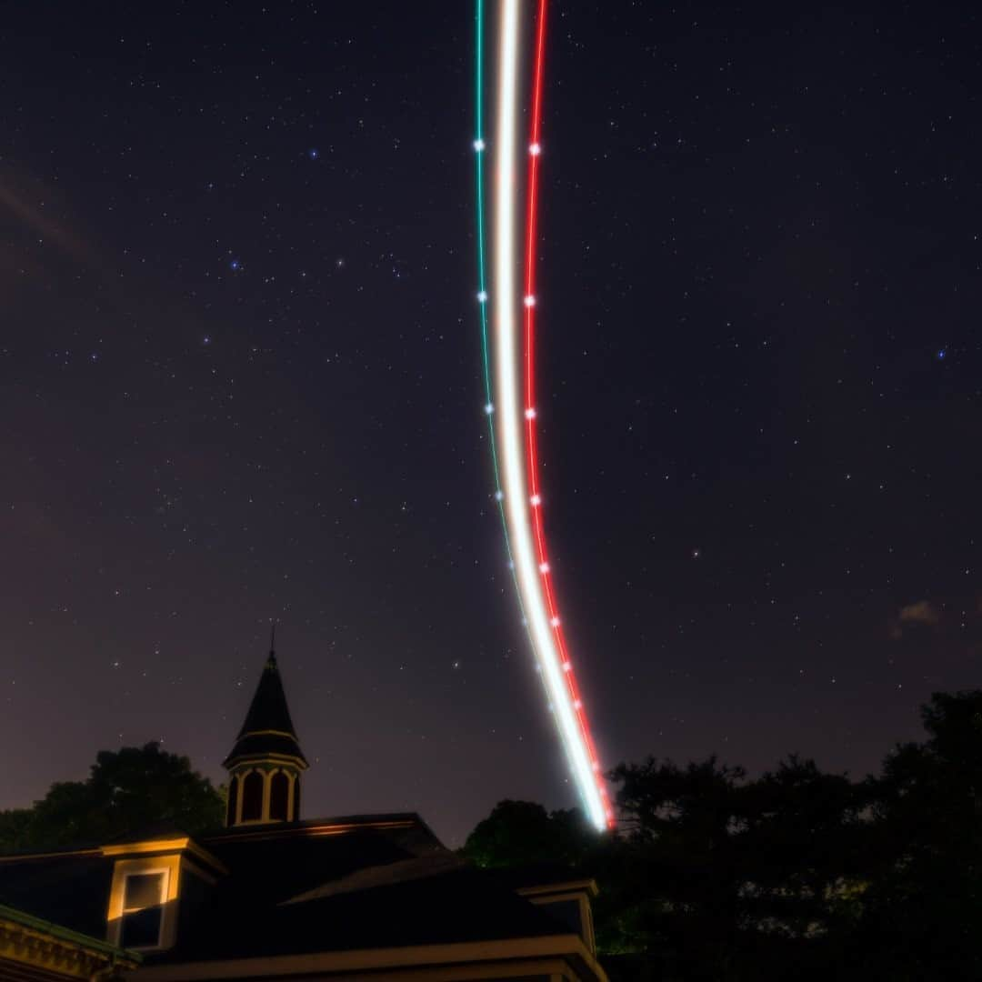 National Geographic Travelさんのインスタグラム写真 - (National Geographic TravelInstagram)「Photo by @babaktafreshi / A plane landing at Boston Logan Airport flies through this six-second exposure of the suburban night sky. Constellation Cassiopeia appears in the top left. The number of passengers traveling by air is slowly increasing from the historic lows caused by the pandemic. But according to TSA daily checkpoint counts, the number of air travelers in the United States is still just 25 to 40 percent of what it was at this time last year.  Explore more of the world at night photography with me @babaktafreshi. #travel #pandemic #nightphotography」10月4日 9時05分 - natgeotravel