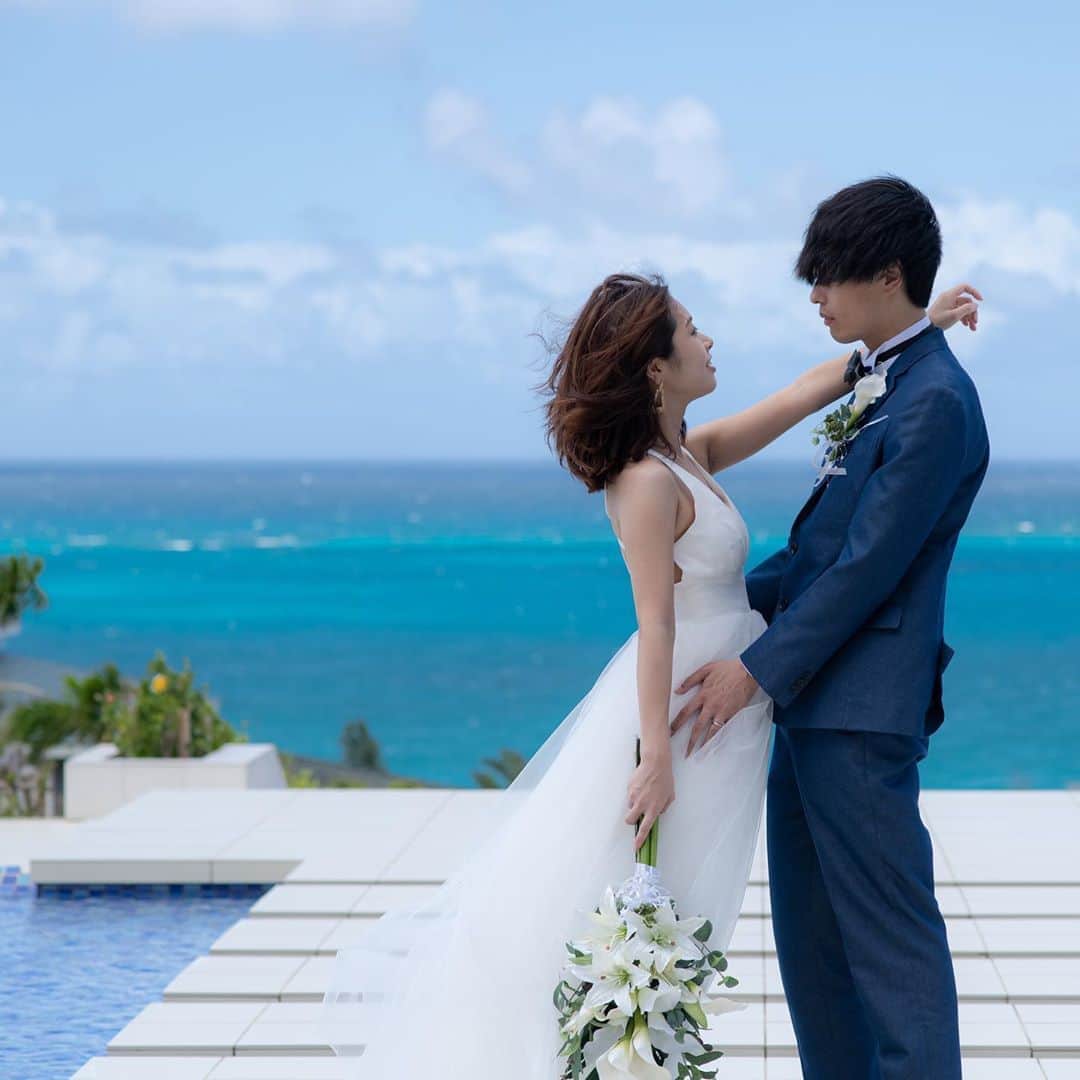 片桐優妃さんのインスタグラム写真 - (片桐優妃Instagram)「#宮古島 の写真が届いたので時間をかけてちょっとずつあげていこうと思います🙆‍♀️ . これはロケーション的には一番気に入ってる写真📷 . #seawoodhotel さんをお借りしたのですがめちゃめちゃ素敵なところでした😭💕 . 彼てきには風が強くて髪が気になったみたいですが🙈青い空と海と一緒に写真が撮りたいと思ってたのでそれが叶ってとっても嬉しいです😊💙 . . . #宮古島フォトウェディング #フォトウエディング #ウエディングフォト #沖縄 #ytywedding #dressproduction #リゾートウエディング」10月4日 10時08分 - yuki710