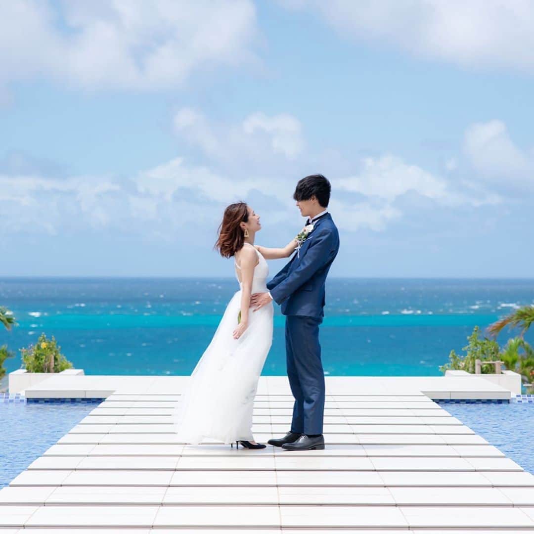片桐優妃さんのインスタグラム写真 - (片桐優妃Instagram)「#宮古島 の写真が届いたので時間をかけてちょっとずつあげていこうと思います🙆‍♀️ . これはロケーション的には一番気に入ってる写真📷 . #seawoodhotel さんをお借りしたのですがめちゃめちゃ素敵なところでした😭💕 . 彼てきには風が強くて髪が気になったみたいですが🙈青い空と海と一緒に写真が撮りたいと思ってたのでそれが叶ってとっても嬉しいです😊💙 . . . #宮古島フォトウェディング #フォトウエディング #ウエディングフォト #沖縄 #ytywedding #dressproduction #リゾートウエディング」10月4日 10時08分 - yuki710