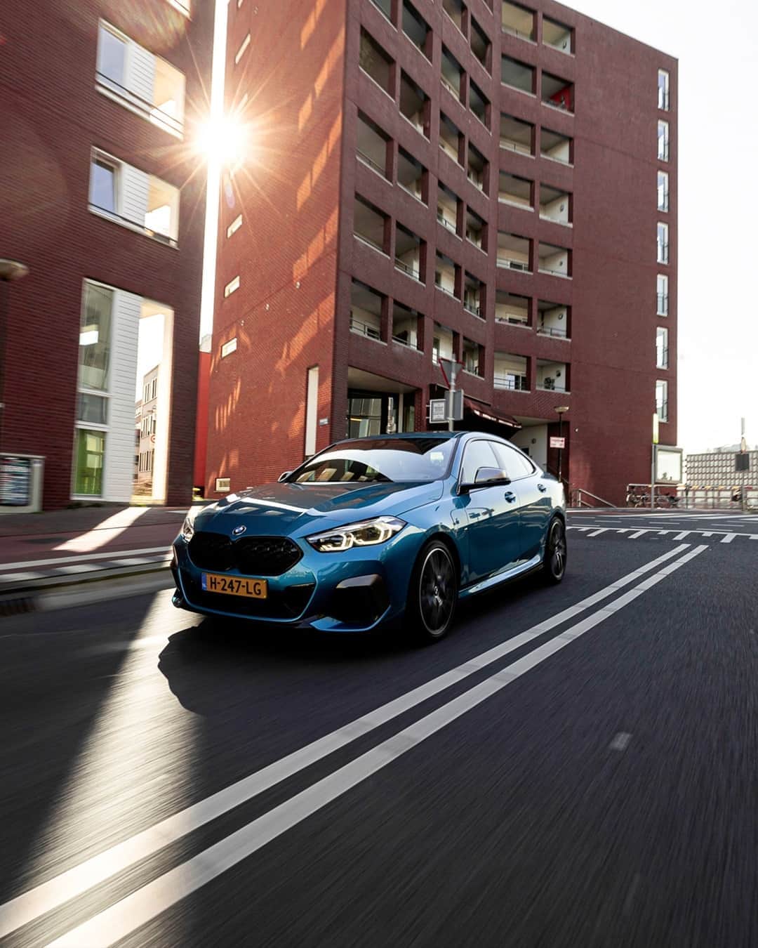 BMWのインスタグラム：「It's not what you do. It's the attitude. The BMW 2 Series Gran Coupé. #THE2 #BMW #2Series @bmwnderland @ericvanvuuren __ BMW M235i xDrive Gran Coupé: Fuel consumption in l/100 km (combined): 7.1–6.7. CO2 emissions in g/km (combined): 162–153. Further information: www.bmw.com/disclaimer.  	 Acceleration (0-100 km/h): 4.9 s. Power: 225 kW, 306 hp, 450 Nm. Top speed (limited): 250 km/h.」