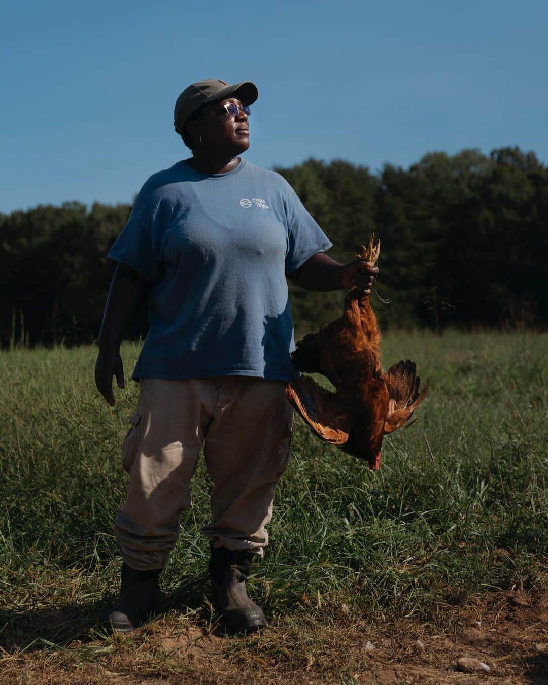 National Geographic Creativeさんのインスタグラム写真 - (National Geographic CreativeInstagram)「Photo by @annieflanagan / “I want to see this land thrive,” Robin Thirkill, 45, said while working on her farmstead, Flossies Farmstead, in Prospect, Virginia. Here, she holds a chicken before slaughter. Robin, who works as a hospice nurse on the weekends, moved to her family’s land in 2007 and began farming soon after. Thirkill, was featured in the eighth episode of Country Queers podcast, an oral history project gathering rural queer stories.」10月5日 22時22分 - natgeointhefield