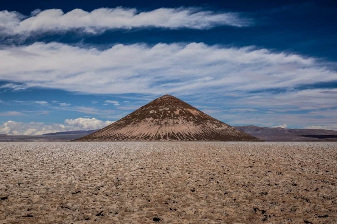 National Geographic Travelさんのインスタグラム写真 - (National Geographic TravelInstagram)「Photo by @mridulaamin / Cono de Arita is the only object that sits in the middle of the Andean salt flats, Salar de Arizaro, in Argentina. How it came to be here is still a mystery. Sitting over 400 feet (122 meters) tall, it commands attention among the sea of white salt. I spent an incredible few days 4WD off-roading to reach this part of the remote Argentinian Puna. Follow @mridulaamin for photography from around the world. #Argentina #SouthAmerica #SaltFlats」10月5日 23時03分 - natgeotravel