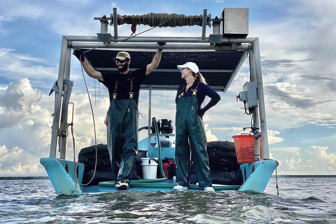 National Geographic Creativeさんのインスタグラム写真 - (National Geographic CreativeInstagram)「Photos by @CarltonWard  in the first frame, @morth_photo captures split-level video of clam farmer Ian Stone harvesting clams on his family’s lease in the Gulf of Mexico near Cedar Key. Ian’s sister and business partner @gretchstone works on the boat in the background. They will be featured in the #LastWildPlaces film about the Florida Wildlife Corridor we are producing with @insidenatgeo. In the subsequent behind-the-scenes photos, filmmakers @danny_schmidt (green shirt) and @ricksmith_media work to portray Gretchen and Ian’s lives, including setting up and interview with Gretchen. Camera assistant @leyoho got in on the action (7th photo). Please follow me @carltonward and @pathofthepanther to learn how the Florida Wildlife Corridor is vital to all Floridans and visitors. @fl_wildcorridor #keepflwild」9月12日 3時58分 - natgeointhefield