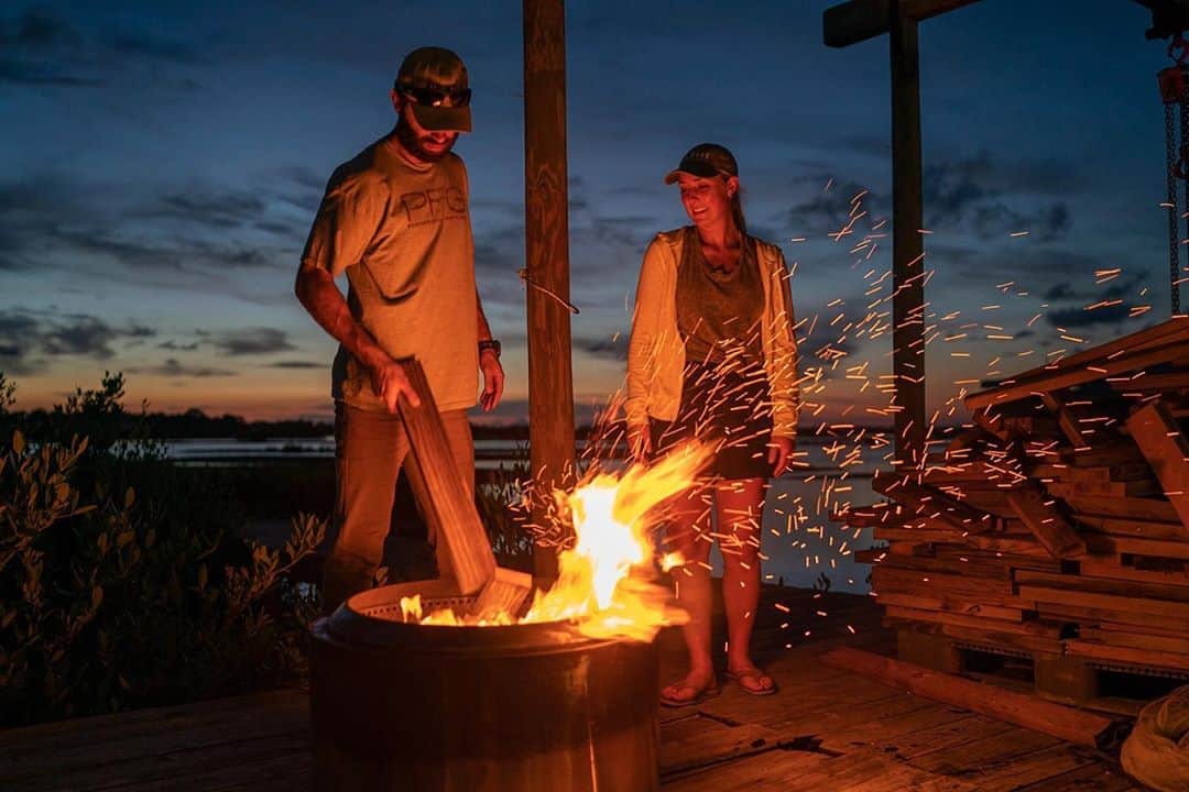 National Geographic Creativeさんのインスタグラム写真 - (National Geographic CreativeInstagram)「Photos by @CarltonWard  in the first frame, @morth_photo captures split-level video of clam farmer Ian Stone harvesting clams on his family’s lease in the Gulf of Mexico near Cedar Key. Ian’s sister and business partner @gretchstone works on the boat in the background. They will be featured in the #LastWildPlaces film about the Florida Wildlife Corridor we are producing with @insidenatgeo. In the subsequent behind-the-scenes photos, filmmakers @danny_schmidt (green shirt) and @ricksmith_media work to portray Gretchen and Ian’s lives, including setting up and interview with Gretchen. Camera assistant @leyoho got in on the action (7th photo). Please follow me @carltonward and @pathofthepanther to learn how the Florida Wildlife Corridor is vital to all Floridans and visitors. @fl_wildcorridor #keepflwild」9月12日 3時58分 - natgeointhefield