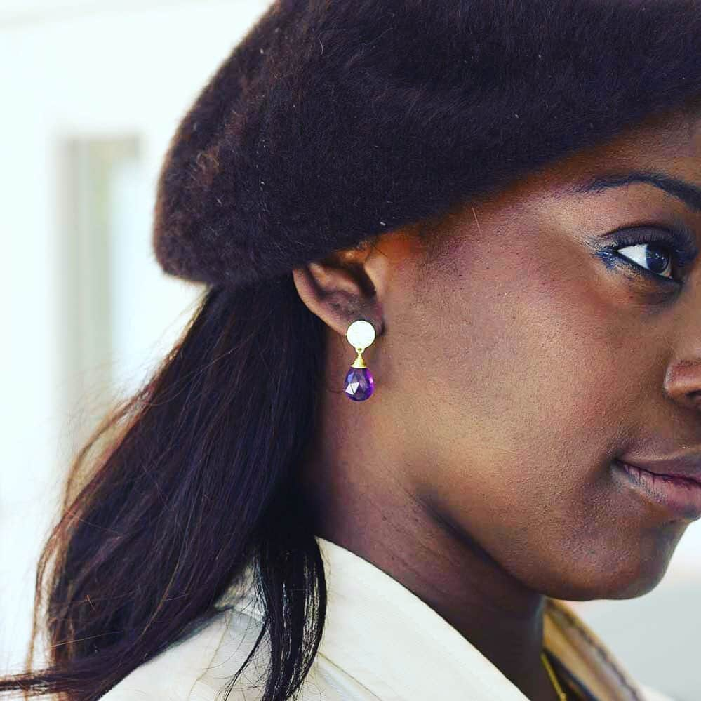 アズニさんのインスタグラム写真 - (アズニInstagram)「When the cooler months come and it’s time to wrap up - you’ll need to add a pop of colour.  Enter, our drop stone earring in amethyst. (Or indeed any of the other gorgeous colours this comes in) Hidden bonus: Superb choice for a Saturday night if you believe as the Greeks did, that Amethyst (from the Greek words meaning not and intoxicate) will protect you from being drunk 😉  ** new stock arriving soon but other colours available!!  #crystalhealing #crystalhealingjewelry #crystalhealingstones #healingstonesandcrystals #amethystjewellery #meaningfuljewellery #gemstonejewellery #loveamethyst #crystalhealers #katemiddleton #duchessofcambridge #duchessofsussex #duchesskate #katestyle #kateblogger #royalfamilyblogger #katemiddletonblogger #competition #giveaway #jewellerygiveaway #katescloset #azuni #azunilondon #fashionthatgivesback #foryouandtheworld #lookgooddogood #fashionthechange」9月13日 4時19分 - azunilondon