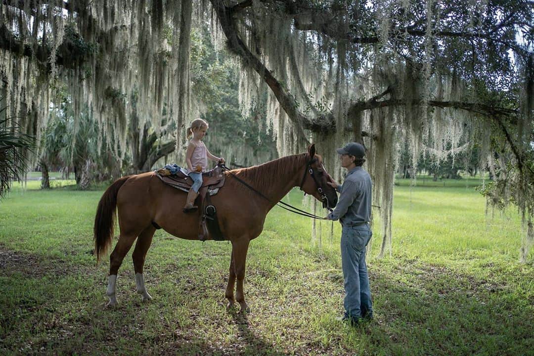 National Geographic Creativeさんのインスタグラム写真 - (National Geographic CreativeInstagram)「Photo by @carltonward / A highlight of our film expedition was getting to spend a day with my own family. I am one of the six characters in the National Geographic Society’s Last Wild Places film about the Florida Wildlife Corridor. The film team visited my family’s ranch in Central Florida and I was able to see my wife and ride horses and check camera traps with my kids, who are 9th generation Floridians. That’s me and my oldest daughter Eldridge in the first photo, captured by director @danny_schmidt, who is also in then final photo standing behind @ricksmith_media. My motivation is to improve land conservation policies so that next generation of people connected to working farms and ranches will have alternatives to the development that is otherwise on track to consume most of the remaining green space in Florida. @pathofthepanther is a #LastWildPlaces partner with @insidenatgeo. Please connect with me @carltonward and @fl_wildcorridor as we fight to #keepFLWild.」9月13日 5時58分 - natgeointhefield