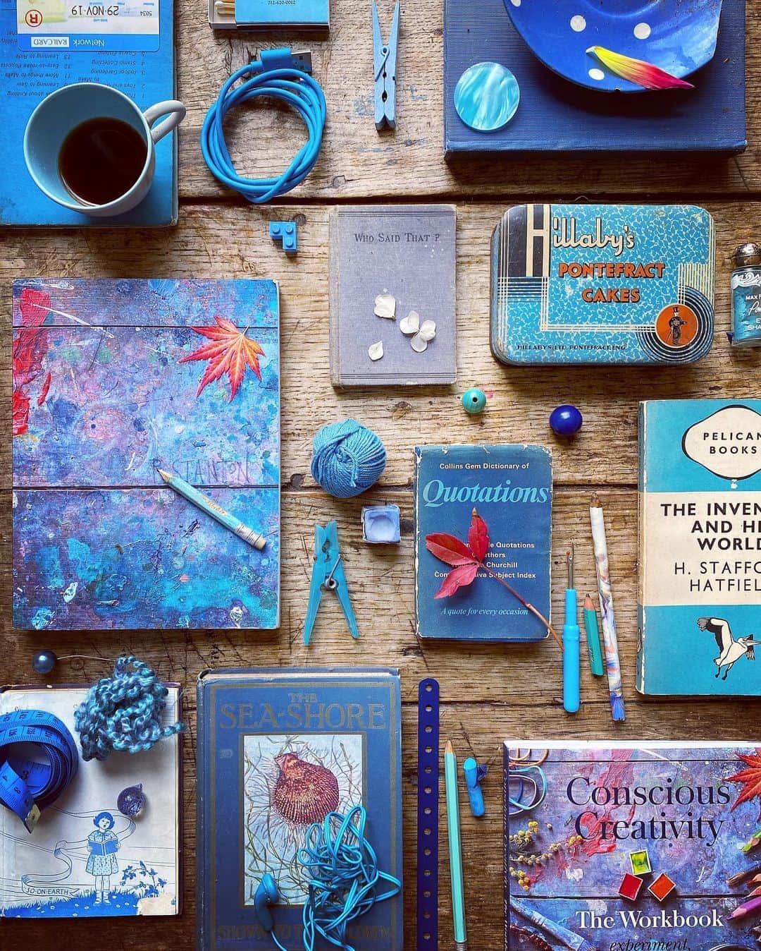 Tea and sittingのインスタグラム：「📘🗳💎...when I put this arrangement together just now, the last element I added was the hot coffee...As soon as I got the lid off the tin and took in the smell, I knew that’s what this whole image should smell like! So if you have any coffee nearby, try smelling it when you look at this ☕️👃💭 * Also, just a reminder that I’m being interviewed Live over on @damianbarrliterarysalon this morning at 11am GMT...talking about both #consciouscreativity books, sensory stuff and colour blindness, as well as giving away some copies of The Workbook in his feed...you just have to like the Giveaway post on his feed, tag a friend on it to be in with a chance of a free book 🤩! * #CCTheWorkbook #5ftinftable #domesticforaging #bluecollection」