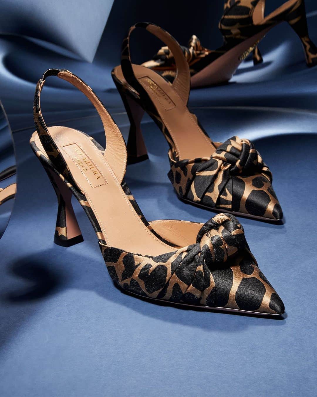Saks Fifth Avenueのインスタグラム：「@aquazzura creates a stylish point of interest this season with a printed take on the label's signature slingback heel. #10022SHOE」
