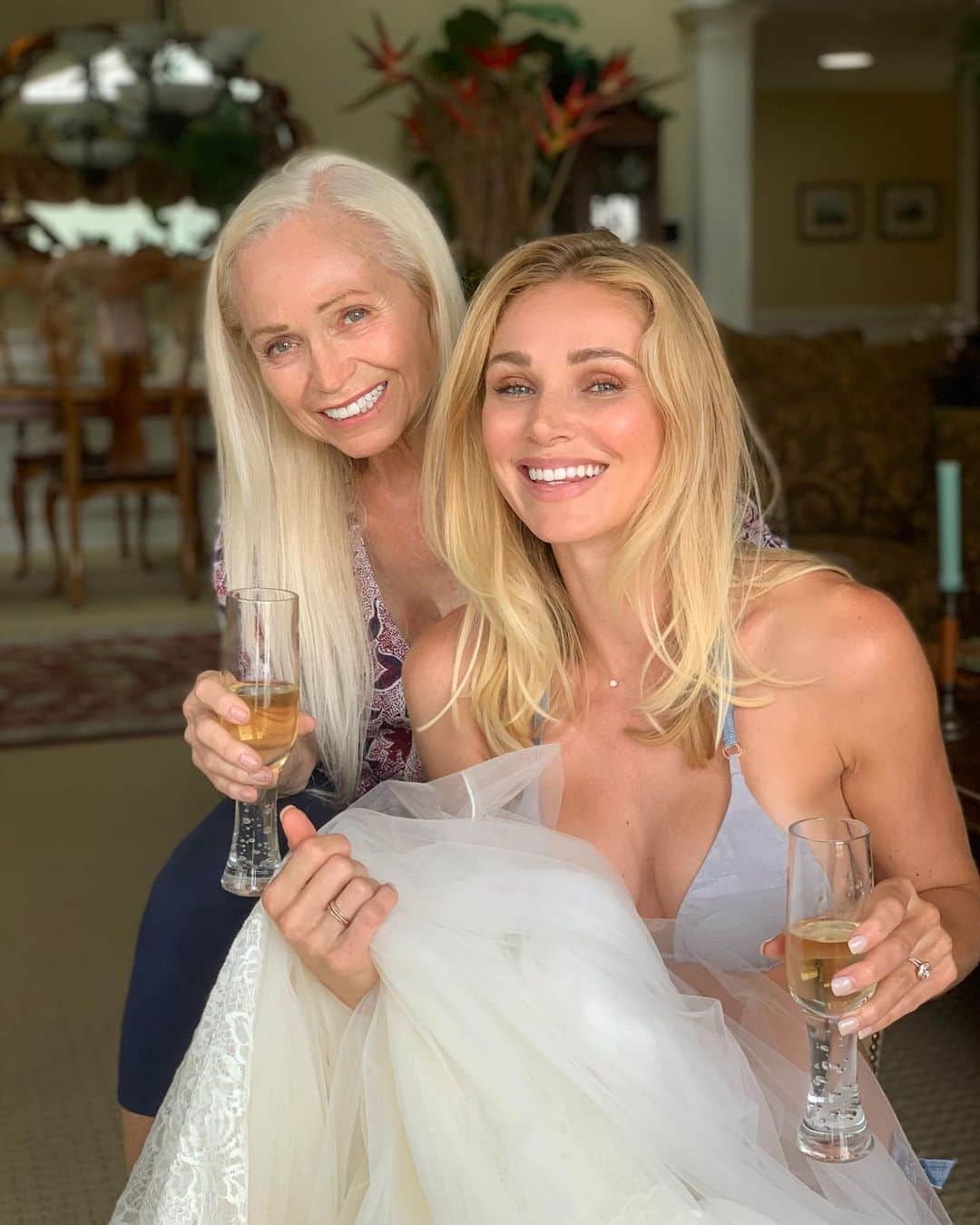 のインスタグラム：「Celebrating my 34th birthday at home with my family trying on the first prototypes of my wedding dress! Even though we are now having a micro wedding I am still creating my dream dress. 🥰 And I cannot wait to be wearing it in exactly 6 weeks. Couldn’t have asked for a better way to spend my birthday. My heart is so full! ❤️🍾」