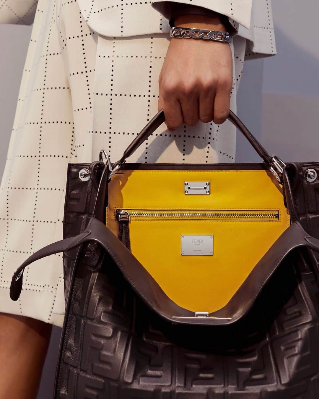 Fendiさんのインスタグラム写真 - (FendiInstagram)「The signature silhouette crafted from FF-embossed leather and accented with a pop of color for added flair – you can’t go wrong with the #FendiPeekaboo bag. Head to the link in bio to explore the #FendiPreFall20 edit of keep-forever investment pieces.   Photographer: @josh._.hight Stylist: @ganio Models: Yang Hao & Mitchell Gorthy」9月14日 21時41分 - fendi