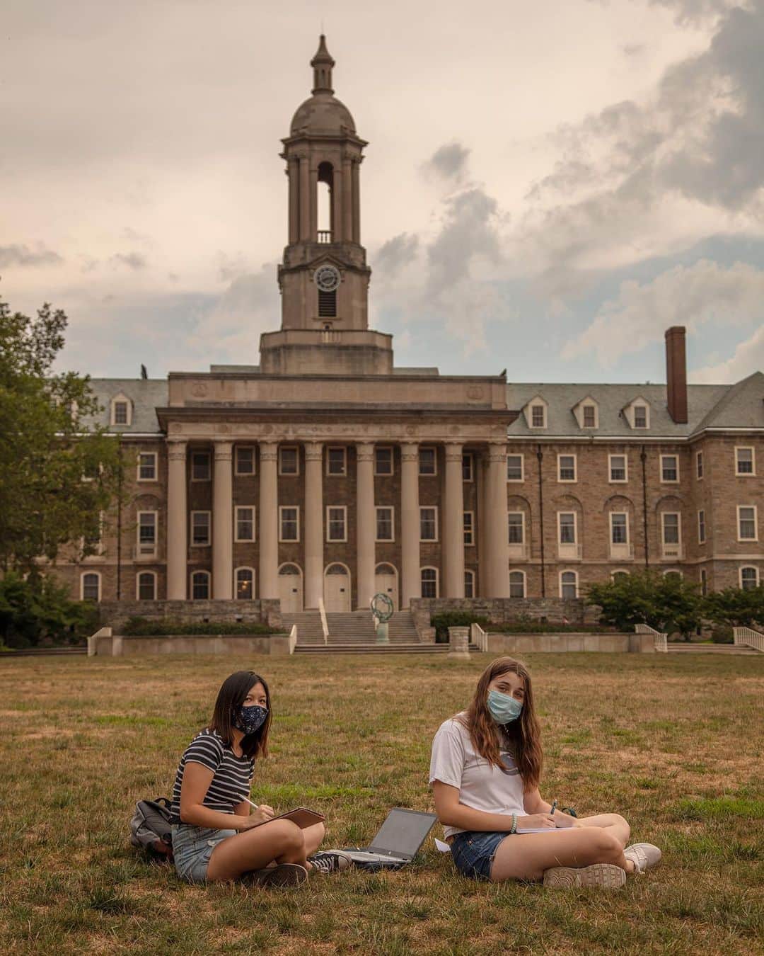 TIME Magazineさんのインスタグラム写真 - (TIME MagazineInstagram)「The typically bustling main campus of Pennsylvania State University is quieter than normal. Many students are tuning in to classes online from their dorm rooms. A town ban on gatherings of more than 10 people limits social life off campus. Mask requirements make recognizing faces and making friends more challenging. Across the United States, colleges have taken a range of approaches to the fall semester. A Chronicle of Higher Education tracker of nearly 3,000 colleges found that of those with firm plans, 19% are opening primarily in person; 27% are primarily online; and 16% are, like Penn State, a mix. Read more, and see more pictures, at the link in bio. Photographs by @evaoleary for TIME」9月15日 2時30分 - time