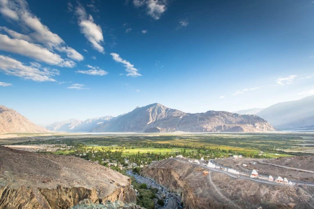 National Geographic Travelさんのインスタグラム写真 - (National Geographic TravelInstagram)「Photo by @emilypolar  Nubra Valley rests in the region of Jammu and Kashmir south of the border of Pakistan. The common way to access this valley is to travel over Khardung La pass from Leh, but a friend and I decided to hike, making our way over the course of a few days. While walking through the region, I loved looking at maps to see where I was spatially in relation to the land surrounding me just out of sight. It may have been the closest I’ve ever been to the Karakoram Range, and that feels pretty cool.  To see more of Ladakh and beyond, follow me @emilypolar.」9月16日 1時06分 - natgeotravel