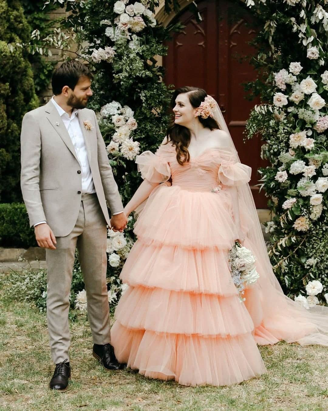 Bedroom diaryのインスタグラム：「With so much change in the air, why not think beyond a white ballgown and opt for a non-traditional wedding dress, instead. After all, how often do you get to steal the spotlight in a feather-adorned frock…or even a tuxedo? This is your day, so you might as well live it up in the dress (or suit) of your dreams. Head to our link in bio for 33 non-traditional wedding dresses to wear for your unconventional fête. 📷  @larahotzphotography via @greenweddingshoes 👗. @velani⁠ 💄  @thefuture_mrs⁠ groom's 🎩  @instutchu」