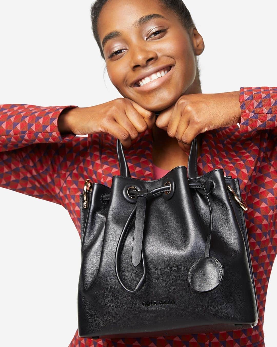Cole Haanのインスタグラム：「Side effects of owning a Grand Ambition Bucket Bag include persistent smiling.」