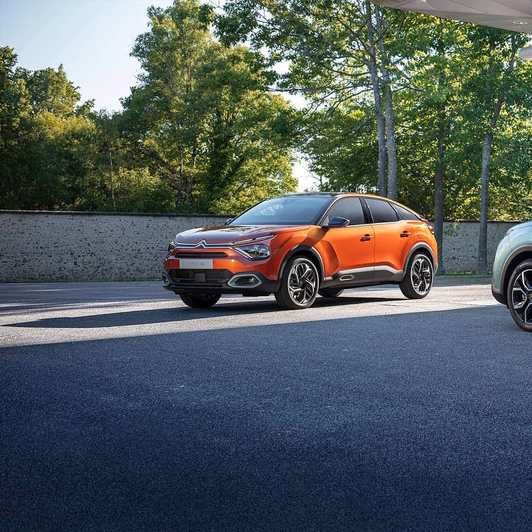 Citroënのインスタグラム：「Open the way!  When you see New Citroën C4, you can’t help but fall for its assertive styling and elegant design.  Also available in 100% ëlectric. #New #Citroen #Car #Orange #Comfort #Light #Style #Instacar #Carsofinstagram #Auto #ËlectricForAll #InspirëdByYouAll #Electric #Fashion #Design #Elegance」