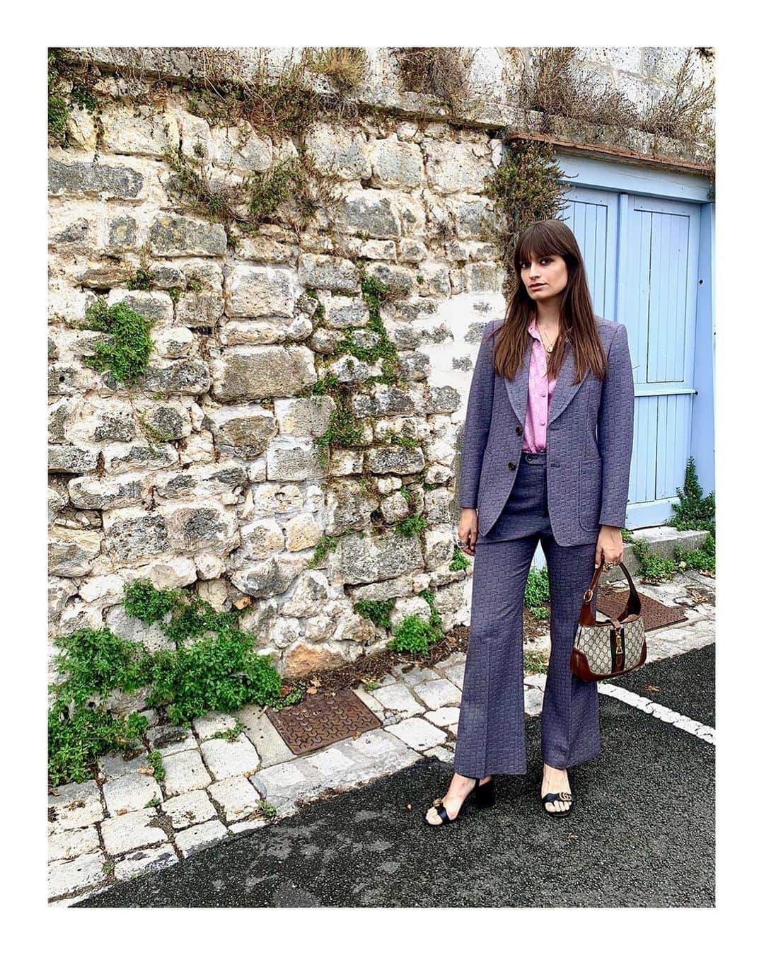 グッチさんのインスタグラム写真 - (グッチInstagram)「The #GucciJackie1961 redesigned by @alessandro_michele is seen at the 13th Angoulême Film Festival @ffangouleme in Angouleme, France, worn by #ClaraLuciani @jesuisclaraluciani with a #GucciPreFall20 two button peak lapel suit with all-over geometric G motif, long sleeve shirt, leather  mid-heel sandals with Double G detail. @alessandro_michele #AlessandroMichele」9月16日 16時30分 - gucci