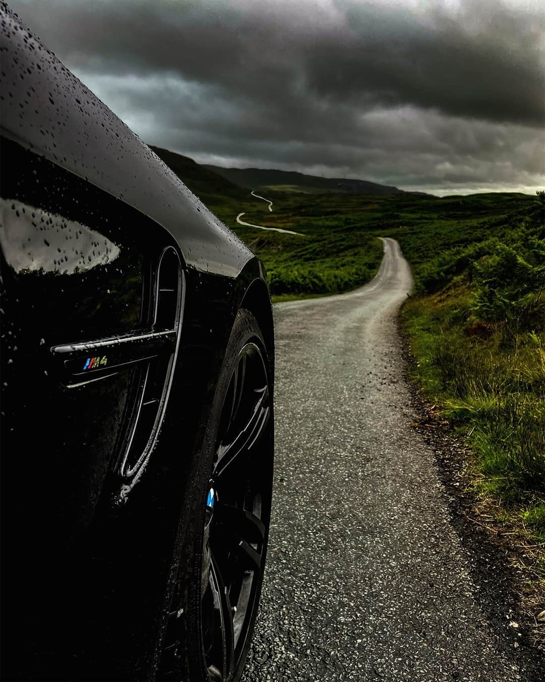 BMWのインスタグラム：「Storm hunter. The BMW M4 Coupé. #TheM4 #BMW #M4 #BMWM #BMWrepost @that_black_m4 @jam__mil __ BMW M4 Coupé with Competition Package: Fuel consumption in l/100 km (combined): 10.0 [9.3]. CO2 emissions in g/km (combined): 227 [213]. Further information: www.bmw.com/disclaimer.  	 Acceleration (0-100 km/h): 4.2 s [4.0 s]. Power: 331 kW, 450 hp, 550 Nm. Top speed (limited): 250 km/h (with optional M Drivers Package: 280 km/h).  	 The figures in brackets refer to the vehicle with seven-speed M double-clutch transmission with Drivelogic.」