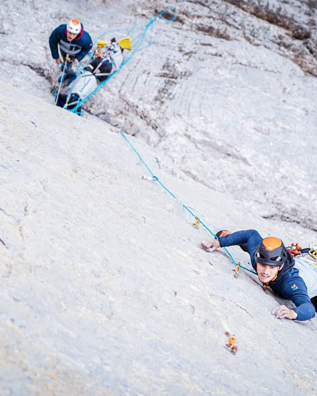 ミレーのインスタグラム：「Paciencia, 8a/900m. Eiger North face, one of the best wall of the Alps according to @symon9v.  After waiting good conditions during the whole summer, Symon and @nilsfavre finally managed to give a go and repeat this masterpiece opened by @stephansiegrist and the late @steckueli. @davidlama_official even called it "one of the most demanding rock route in the Alps".  More about this ascent in our story of the day managed by Symon.   📷 @damienlargeron」