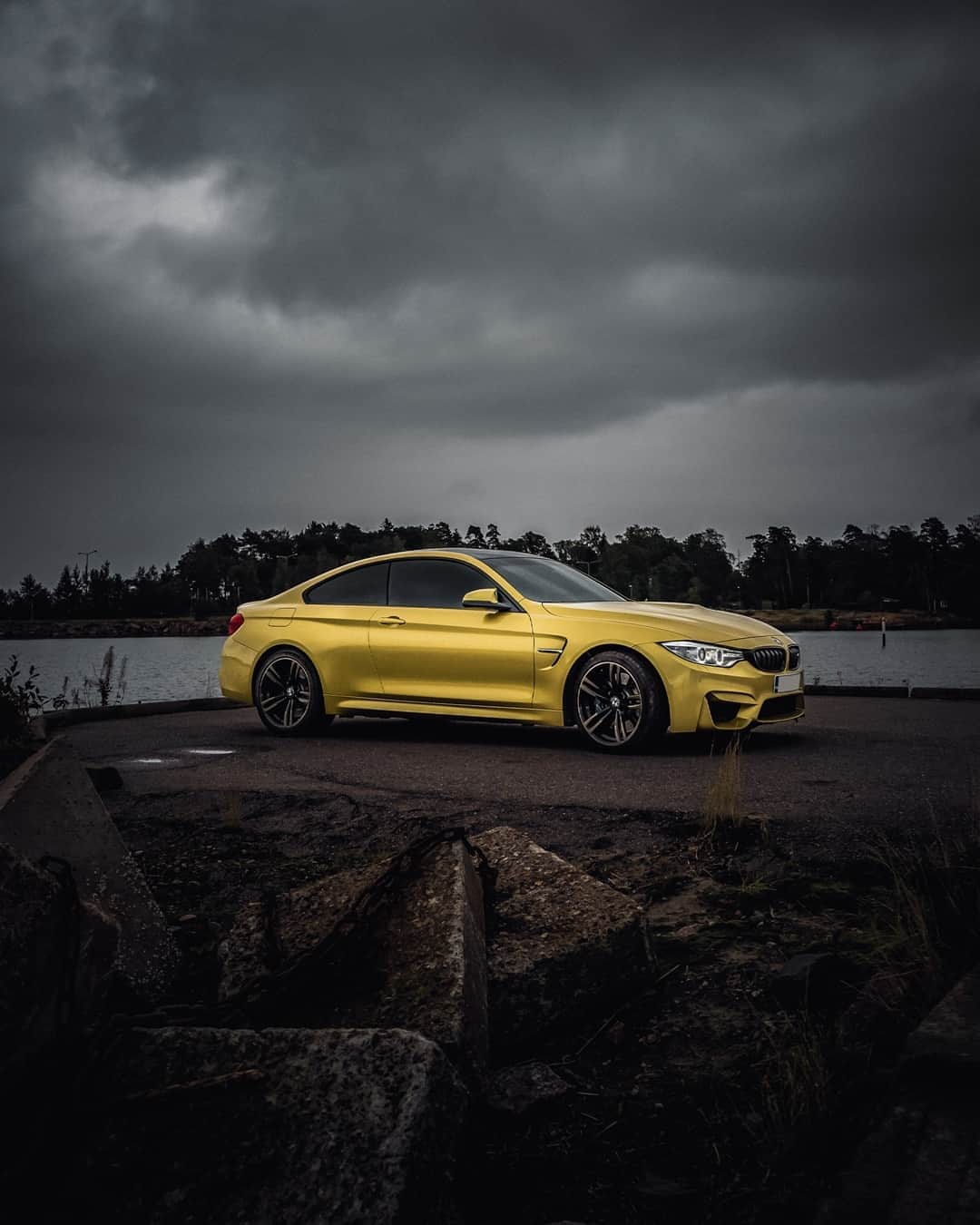 BMWのインスタグラム：「The gloomiest days call for the shiniest attitude.  The BMW M4 Coupé. #TheM4 #BMW #M4 #BMWM #BMWrepost @scc.fi @salasphoto @salasphoto_cars __ BMW M4 Coupé: Fuel consumption in l/100 km (combined): 10.9–10.5. CO2 emissions in g/km (combined): 249–239.* Further information: www.bmw.com/disclaimer.  	 * All performance, fuel consumption and emissions figures are provisional.」