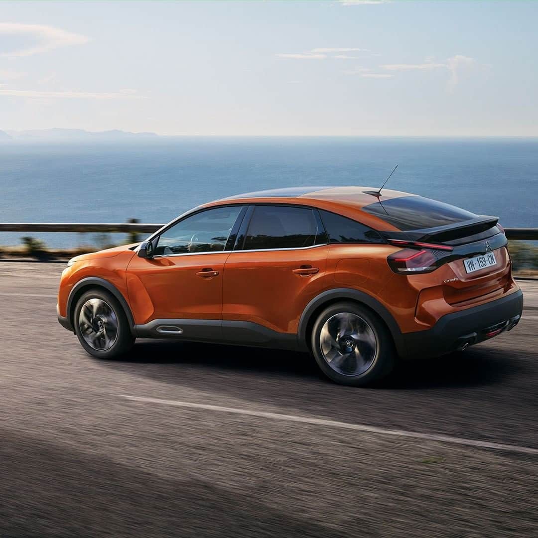 Citroënのインスタグラム：「Open the way! New Citroën C4, the compact hatch that marries form and function, with its Citroën Suspension with Progressive Hydraulic Cushions® and its Advanced Comfort Seats for your long car trips 😏 Also available in 100% ëlectric. #New #Citroen #Car #Orange #Comfort #Elegance #Design #Fashion #Light  #Style #Instacar #Carsofinstagram #Auto」