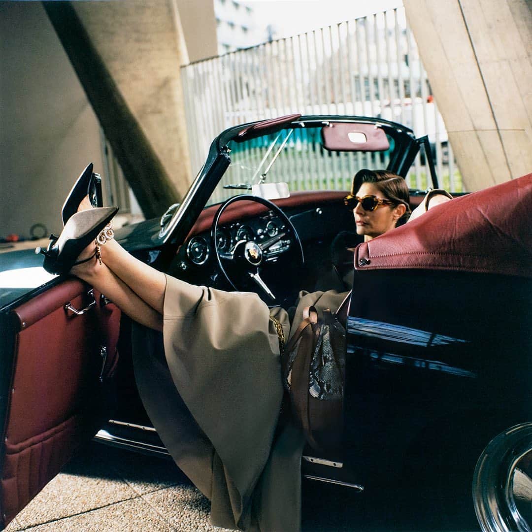 LVMHさんのインスタグラム写真 - (LVMHInstagram)「This new month comes with multiple creations from our Maisons.  Photographed by Fumiko Imano, the new @loewe publication tells the story of Chiara Mastroianni pulling up to Paris’ Maison de l’UNESCO in a classic car.  She is dressed in a selection of key outerwear from the LOEWE FW20 collection accessorised with the iconic Balloon bag, designed by Jonathan Anderson.  Featuring #ChiaraMastroianni Photography @FumikoImano Creative direction @Jonathan.Anderson and @MMparisdotcom Styling @BenjaminBruno_ Casting @AshleyBrokaw Make-up @PatMcGrathReal Hair Simone Mason Production @HolmesProduction  #LOEWE #LOEWEFW20 #BalloonBag #LOEWEsunglasses #LVMH」9月18日 1時30分 - lvmh