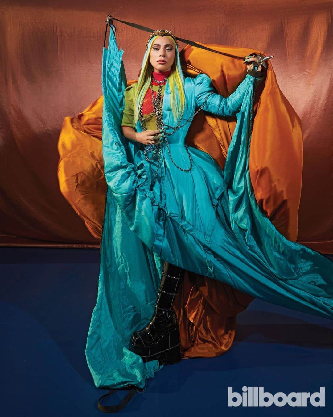 ニコラ・フォルミケッティのインスタグラム：「⚔️ TAKE ME TO WONDERLAND @ladygaga for @billboard   photo @djenebaaduayom  hair @fredericaspiras  make up @sarahtannomakeup  nail @mihonails   gaga wearing @bradleysharpe blue tent dress @jis00jang knit @joseitspain brown skirt (in the back) @ceciliodesigns headpiece @gasolineglamour rings and body chains @lance.v.moore ring @demonia.shoes boots」