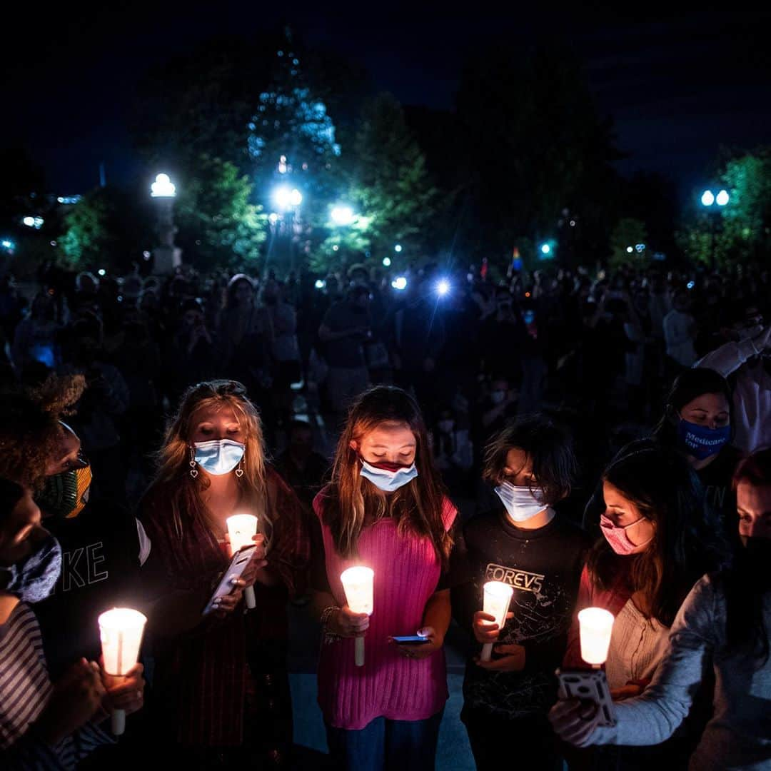 TIME Magazineさんのインスタグラム写真 - (TIME MagazineInstagram)「Candles, flowers and more outside the Supreme Court in Washington, D.C., where crowds gathered to mourn the death of Ruth Bader Ginsburg at 87 on Sept. 18. Ginsburg's early work toward greater equality was often founded on the knowledge—hard won in her own life and evident in the world around her—that the old stereotypes on which many past standards had been built no longer applied, and that life could be better once that fact was recognized, writes Lily Rothman. With that knowledge, brought to bear for her clients and later as an Associate Justice on the Supreme Court, she helped move American jurisprudence a little bit closer to what she saw as its true purpose. That purpose was something she described to @time in 1977, when she was named by the magazine as one of the nation’s top ten law professors: "To reflect and respond to the needs of the society it serves, preserving freedom while preventing turmoil." Read more at the link in bio. Photograph by Joshua Roberts (@jprpix)—@reuters and @al_drago—@reuters」9月19日 14時12分 - time