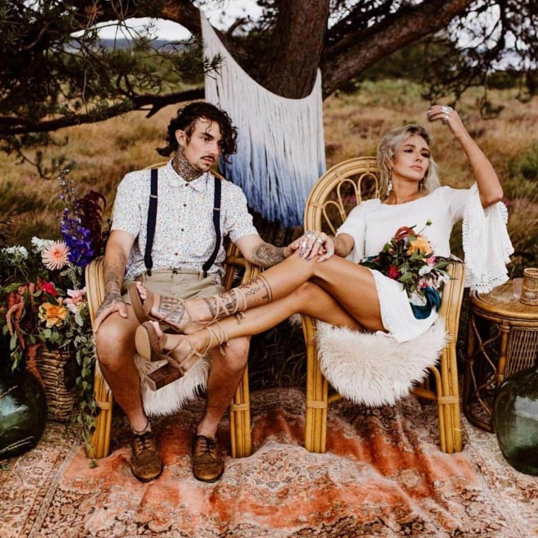 ミナのインスタグラム：「Absolutely blown away by these recent pictures of our Gabrielle dress! Love everything from the props to the tattoos 😍⁠ ⁠  Photography @kissinlight ⁠  Props/Styling: @borrowthemoon ⁠  Floristry: @maia_sellen_floral_designs ⁠  Hair and Makeup: @hannahcascarinomua ⁠ Model:@olasuddrey ⁠  Dress: @indiebride.london ⁠」