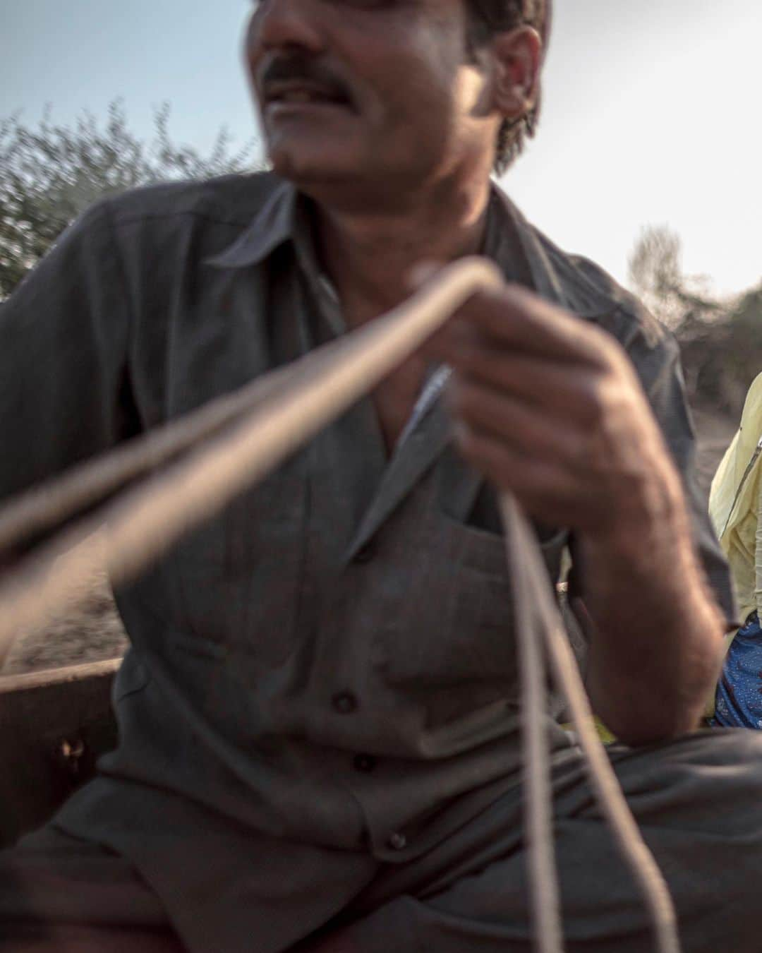 ジョン・スタンメイヤーさんのインスタグラム写真 - (ジョン・スタンメイヤーInstagram)「A late afternoon in Harasar is when I met Santosh Kanwar. She was riding with her husband, Ghilr Dhar Singh, upon their camel-pulled cart, returning from Badabhanisar village. They mentioned that when the mobile phone network finally arrived, their ability to sell the vegetables they grow, expanded as the signal had to this remote area of Rajasthan. These little nuggets of possibilities always excite me, whether where I live or to empower others elsewhere. Such wondrous - and strange - times we are all living in… ⠀⠀⠀⠀⠀⠀⠀ India’s Daunting Challenge: There’s Water Everywhere, And Nowhere - Chapter 8 of the @outofedenwalk, my latest story last months (August 2020) @natgeo magazine. ⠀⠀⠀⠀⠀⠀⠀ #yellowscarf #portrait #husbandandwife #mobilephone #cart #lateafternoon #harasar #rajasthan #india @natgeo @outofedenwalk #walkingindia #edenwalk」9月20日 11時36分 - johnstanmeyer