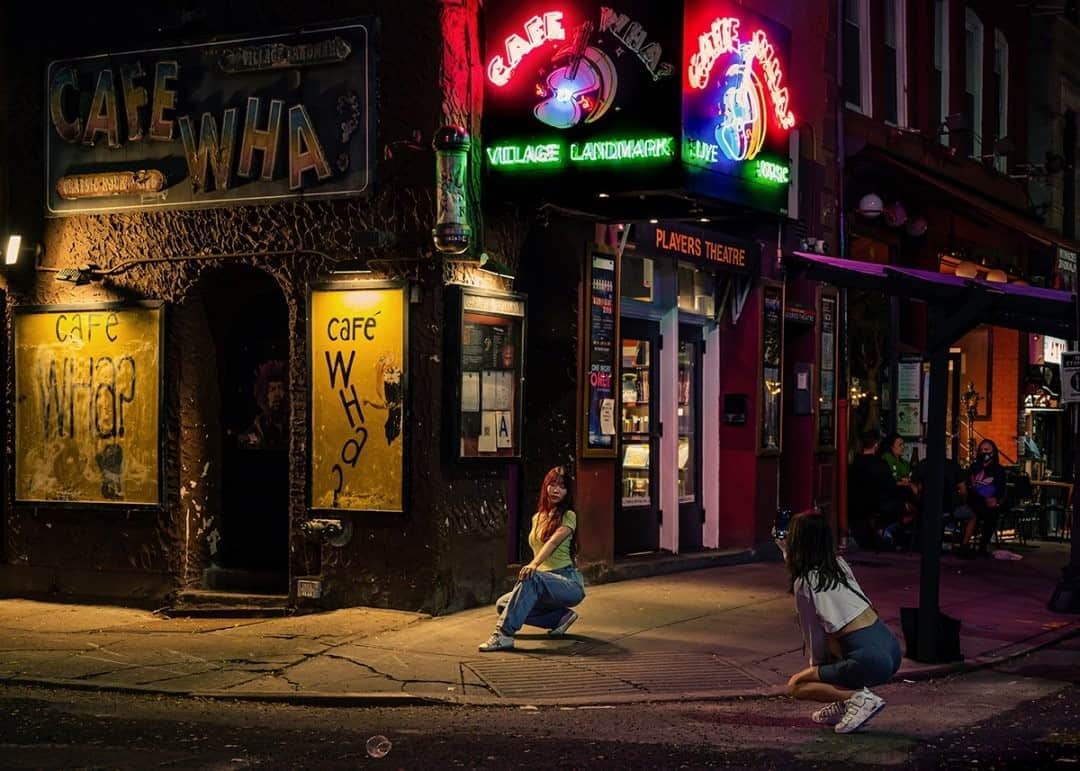 National Geographic Travelさんのインスタグラム写真 - (National Geographic TravelInstagram)「Photo by @dina_litovsky / Two young women pose for photos in front of the iconic Greenwich Village institution Cafe Wha? New York City is finally coming back to life, full of colorful and vibrant atmosphere on weekend nights. For more images of night in NYC, follow me @dina_litovsky.」9月20日 9時05分 - natgeotravel