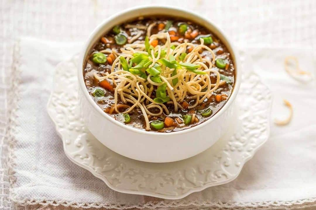 Archana's Kitchenさんのインスタグラム写真 - (Archana's KitchenInstagram)「Vegetable Manchow Soup is a tasty recipe perfect for cold rainy evenings. It's simple, hearty, light and delicious too. With loads of veggies, topped with some fried noodles this recipe is a must try. Get the recipe from the smart.bio link in my profile @archanaskitchen . . . . . . . . #recipes #easyrecipes #snacks #teatime #teatimesnacks #archanaskitchen #pakora #soup #manchowsoup #coldevening #rainydaysnacks #rainydaysoup #pakorarecipes #healthyeating #eatfit #cooking #food #healthyrecipes #foodphotography #recipeoftheday #comfortfood #deliciousfood #monsoonsnacks」9月20日 20時30分 - archanaskitchen