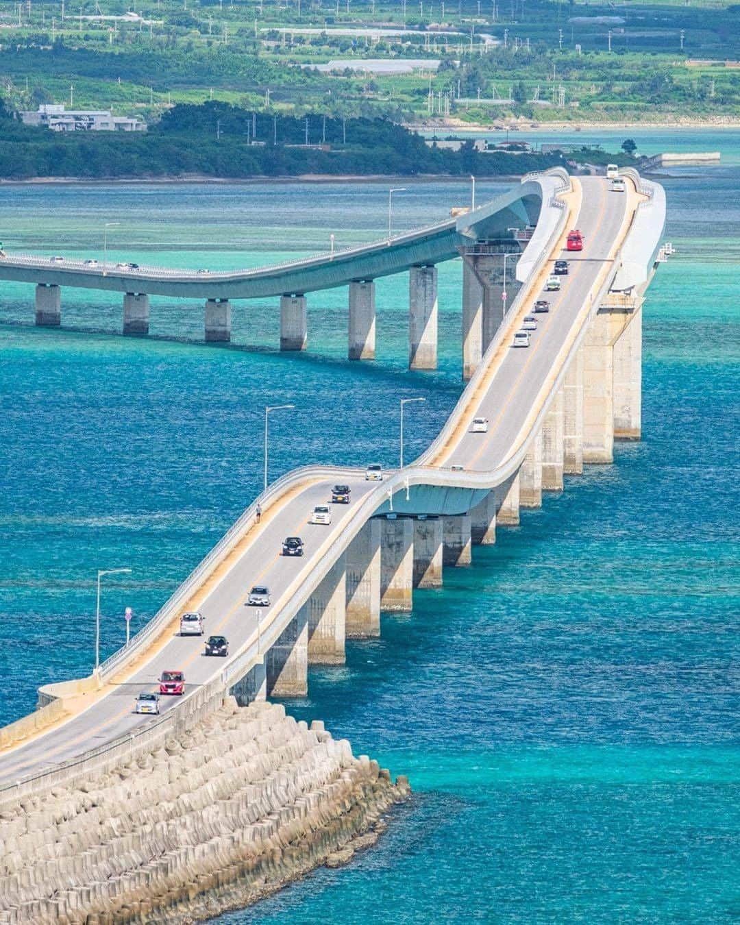 Be.okinawaさんのインスタグラム写真 - (Be.okinawaInstagram)「Irabu Bridge, connecting Miyako Island and Irabu Island, is the longest toll-free bridge in Japan at a length of 3,540 meters. Looking at the bridge from Irabu Island, the view is spectacular with a dynamic height contrast designed this way so that ferries can pass underneath it. For those who are looking for a challenging experience, how about walking or biking across the bridge?😉  📍: Irabu Bridge 📷: @kimiaki_n Thank you for the lovely picture!  Hold on a little bit longer until the day we can welcome you! Experience the charm of Okinawa at home for now! #okinawaathome #staysafe   Tag your own photos from your past memories in Okinawa with #visitokinawa / #beokinawa to give us permission to repost!  #irabubridge #irabuisland #伊良部大橋 #伊良部島 #이라부대교 #이라부섬 #miyakoisland #miyakoislands  #japan #travelgram #instatravel #okinawa #doyoutravel #japan_of_insta #passportready #japantrip #traveldestination #okinawajapan #okinawatrip #沖縄 #沖繩 #오키나와 #旅行 #여행 #打卡 #여행스타그램」9月22日 19時00分 - visitokinawajapan