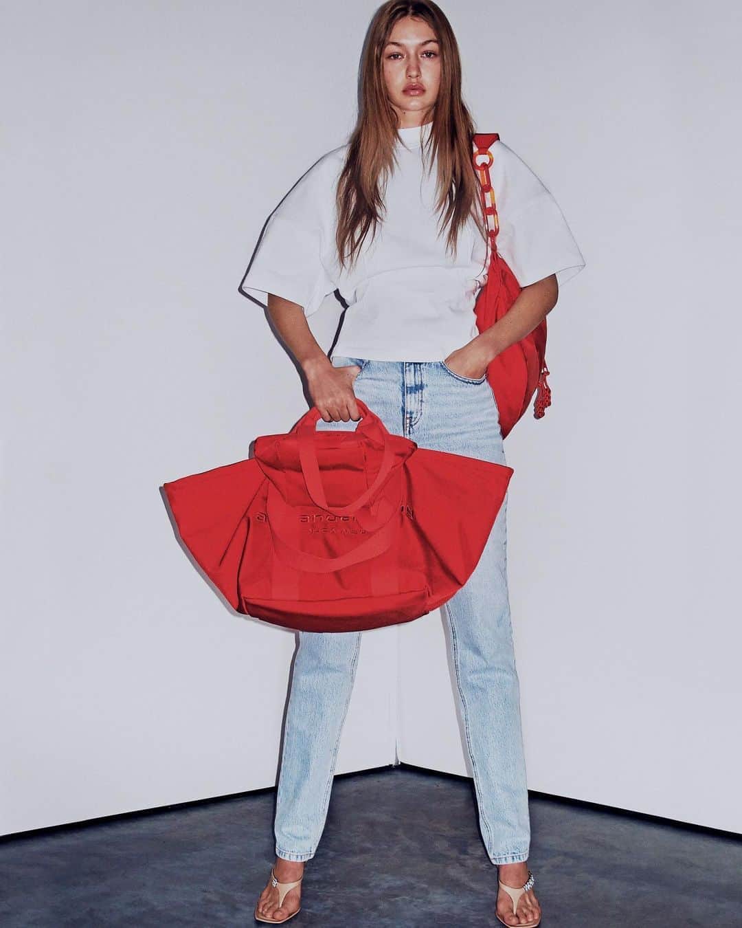 アレキサンダー・ワンのインスタグラム：「When I say I come with major baggage, this is what I mean. -  PRIMAL NYLON LARGE TOTE WITH TONAL LOGO EMBROIDERY.  ATTICA NYLON GYM FANNY PACK WITH ACRYLIC CHAIN AND TONAL LOGO EMBROIDERY.  SHOT TO SHOP BY STEVEN KLEIN.」