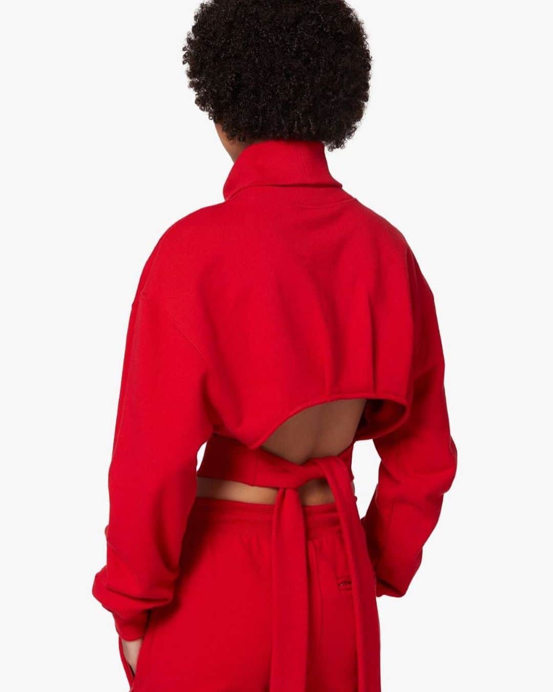 オープニングセレモニーのインスタグラム：「Bow closure & puff sleeves, shop our red cropped sweatshirt on openingceremony.com」