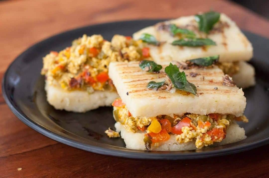 Archana's Kitchenさんのインスタグラム写真 - (Archana's KitchenInstagram)「Dhokla Sandwich With Capsicum And Paneer Recipe, a delicious snack that you can definitely try for your breakfast. It is a spicy roasted bell pepper and crumbled paneer masala sandwiched between two grilled dhokla pieces. Delicious, isn't it?  Get the recipe from the smart.bio link in my profile @archanaskitchen . . . . . . #recipes #easyrecipes #breakfast #Indianbreakfast #archanaskitchen #healthyeating #highprotein #breakfastclub #dosa #dosarecipes #dosabatter #ragi #ragidosa #mysoremasaladosa #homemadefood #eatfit #cooking #food #healthyrecipes #foodphotography #recipeoftheday #comfortfood #deliciousfood #delicious #instayum #food」9月23日 11時30分 - archanaskitchen