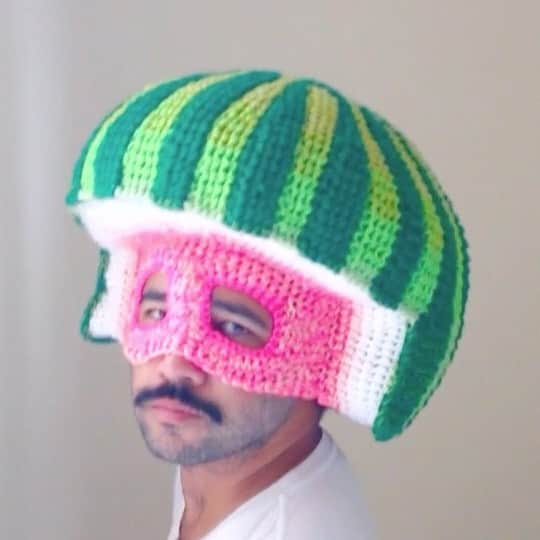 Phil Fergusonのインスタグラム：「THE MASKED WATERMELON  What I lack in seeds I gain in music lololol  Over the years I always have been asked how long it takes to make hats and I always say a day or two. So now after making so many large scale things over the years I forget how quick it is!  It’s funny how resourceful I’ve been with the wool I have in lockdown, it won’t be too long to buy new stuff but at this point, I have so much to repurpose!  Anyway hope everyone is keeping safe xx  #art #fashion #queerart #watermelonhead #fruithat #foodart #maskformask #repurposed #craft #crochet #croyay #crogay」