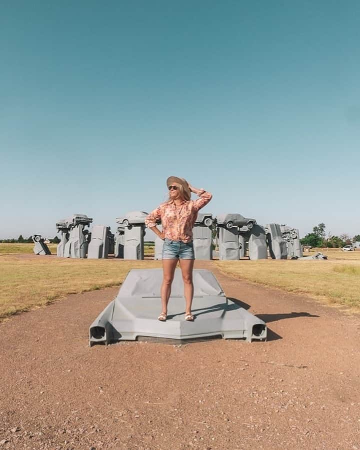 Visit The USAのインスタグラム：「"This is from a two-day road trip to western Nebraska! This right here is known as Carhenge and is located in Alliance. Carhenge was built in 1987 by Jim Reinders. Jim was a man born in Alliance who lived in England and extensively studied Stonehenge. He built Carhenge from vintage automobiles and placed them in the exact formation that the stones at Stonehenge are placed. It was just one of the many entertaining things that I found in Nebraska!" Have you ever discovered a fun road trip find like Carhenge? 🚗 #VisitTheUSA 📸 : @passportsandpreemies」